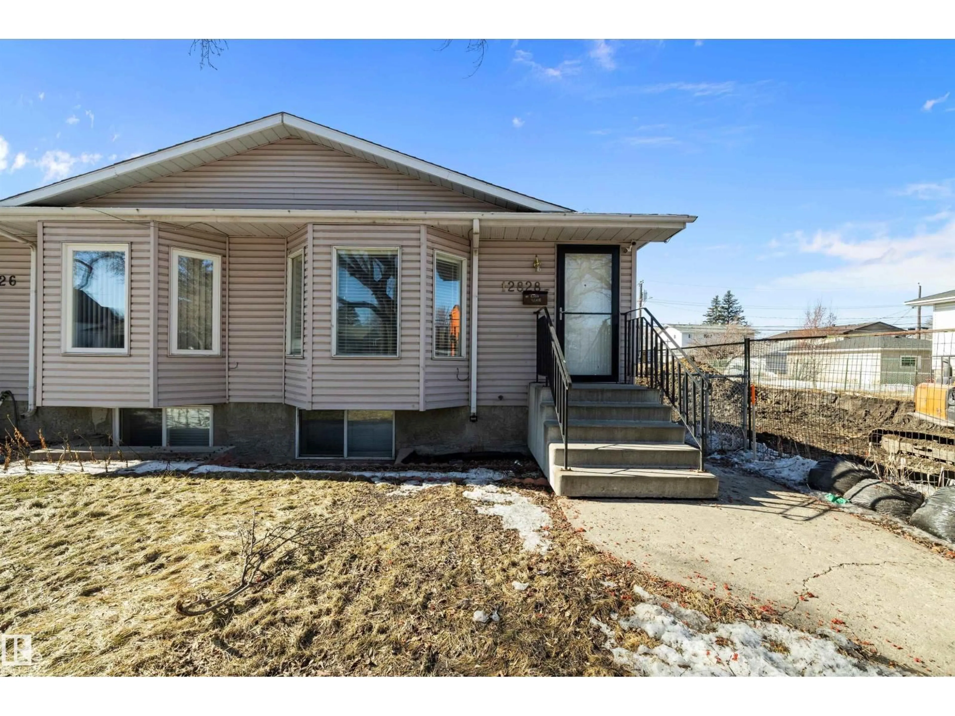 Home with vinyl exterior material, street for NW - 12828 125 ST, Edmonton Alberta T5L0T9