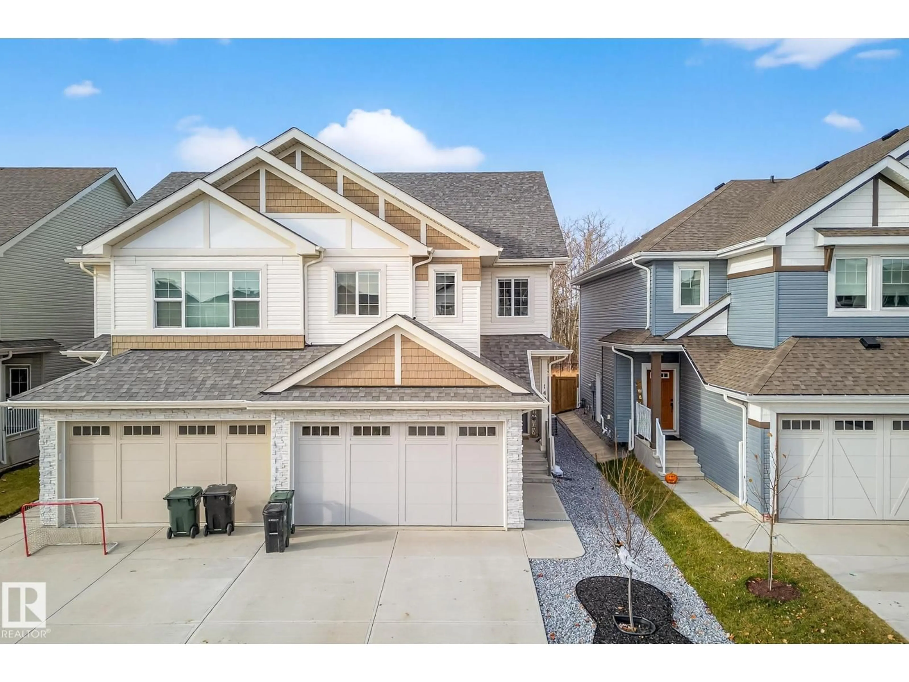 A pic from outside/outdoor area/front of a property/back of a property/a pic from drone, street for 140 RANCHER RD, Ardrossan Alberta T8E0A7