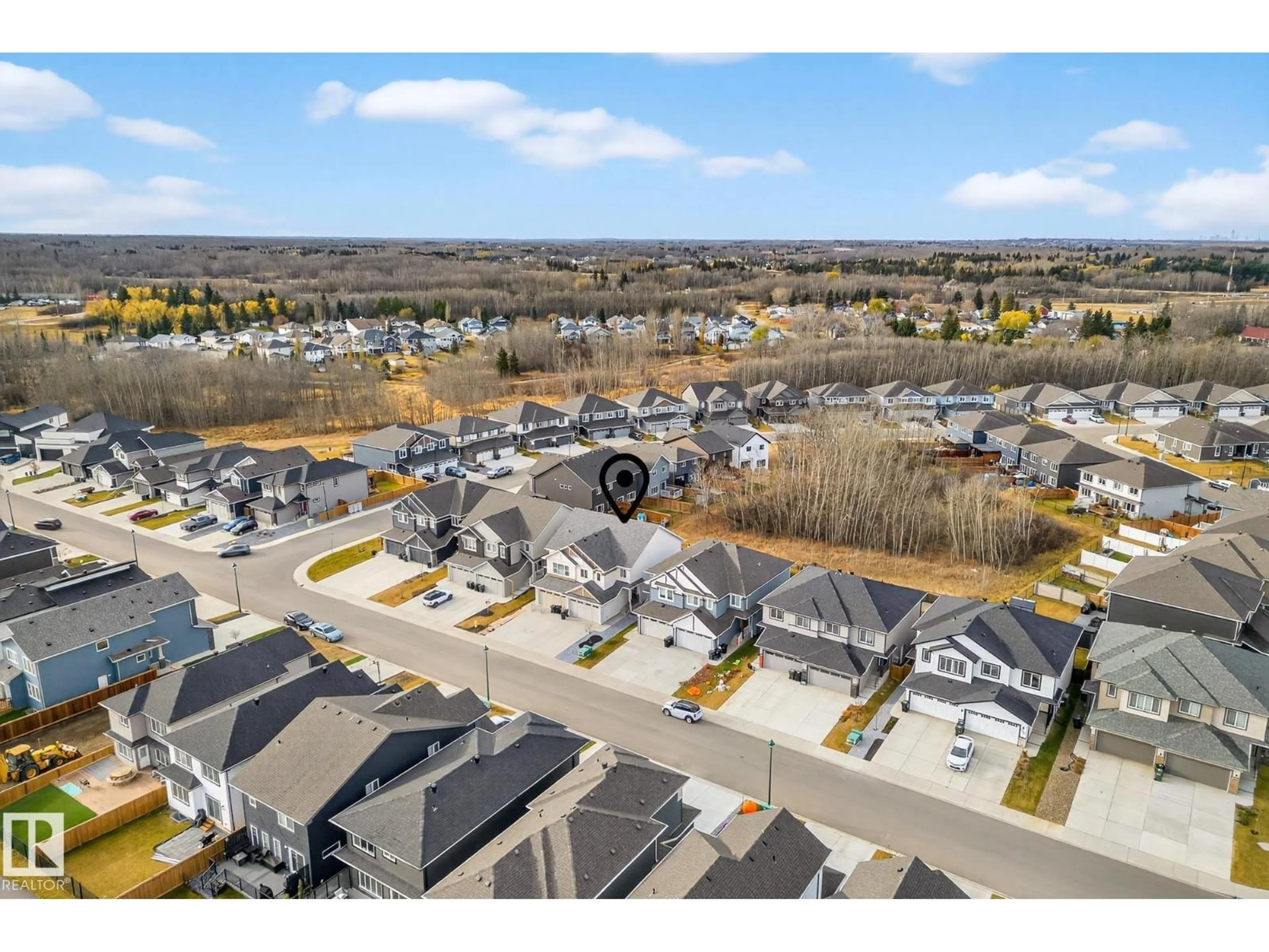 A pic from outside/outdoor area/front of a property/back of a property/a pic from drone, unknown for 140 RANCHER RD, Ardrossan Alberta T8E0A7