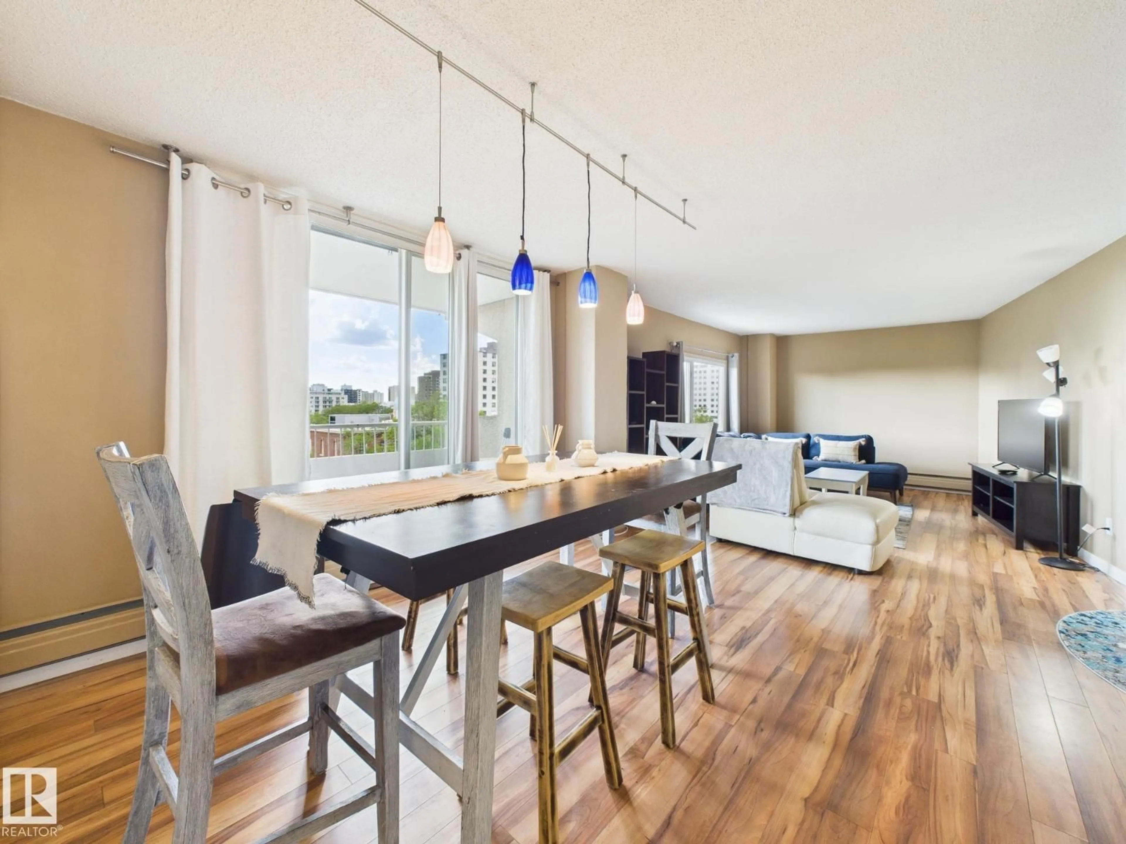 Open concept kitchen, wood/laminate floor for #603 - 9909 110 ST, Edmonton Alberta T5K2E5