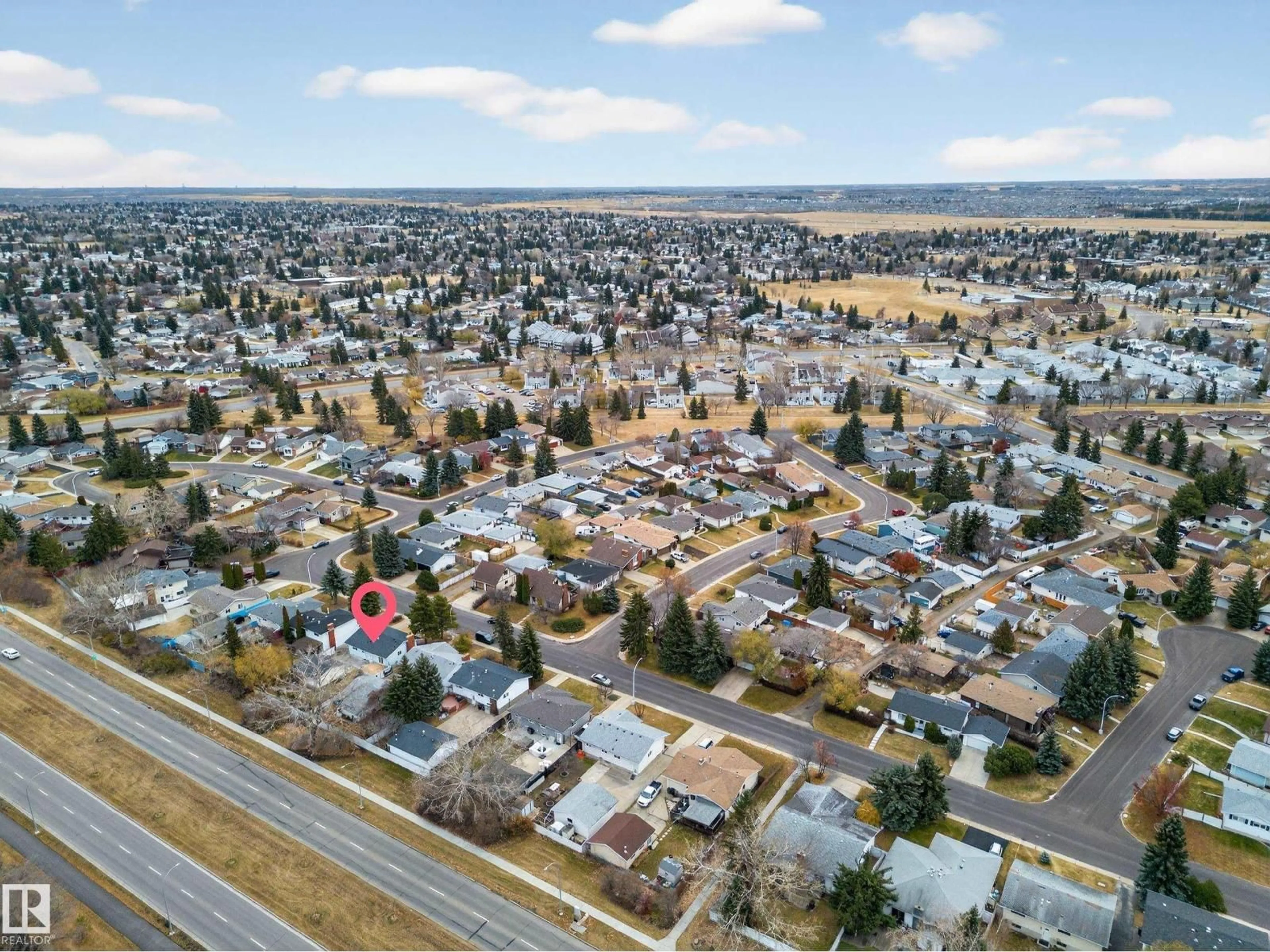 A pic from outside/outdoor area/front of a property/back of a property/a pic from drone, street for 7820 22 AVE, Edmonton Alberta T6K2E3