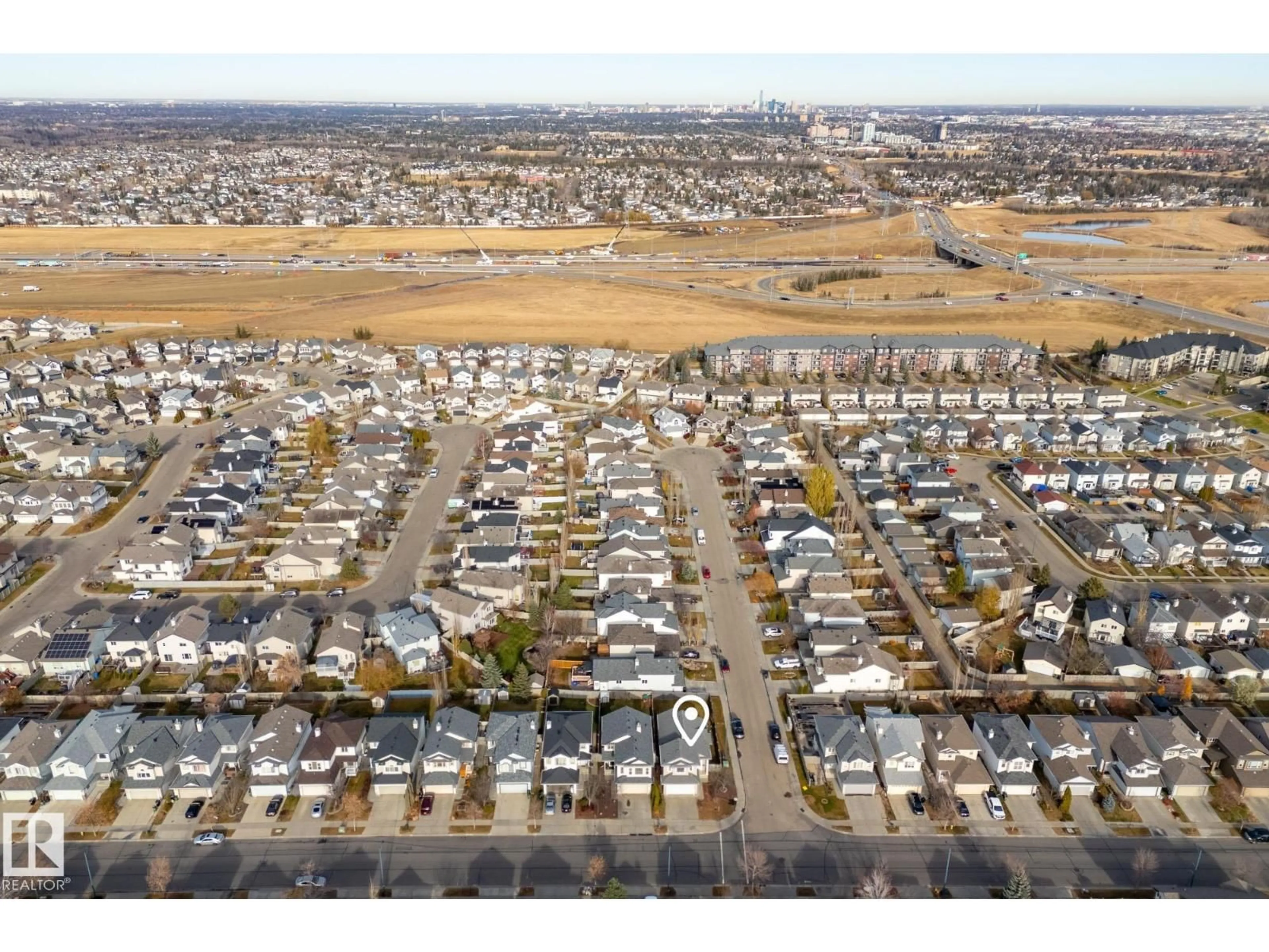 A pic from outside/outdoor area/front of a property/back of a property/a pic from drone, street for 186 MACEWAN RD, Edmonton Alberta T6W1K8