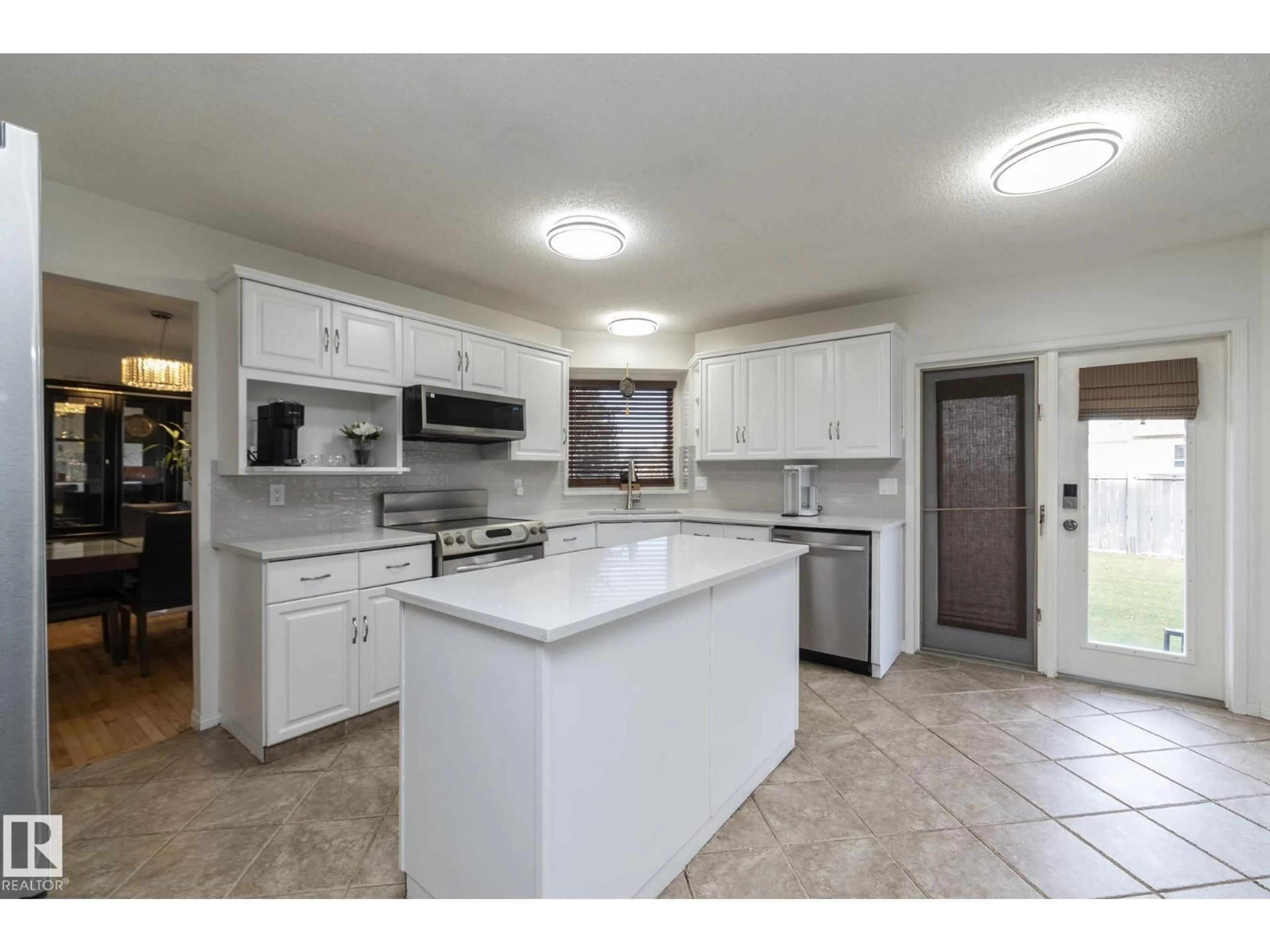 Open concept kitchen, ceramic/tile floor for 12 ELSINORE PL, Edmonton Alberta T5X5W3