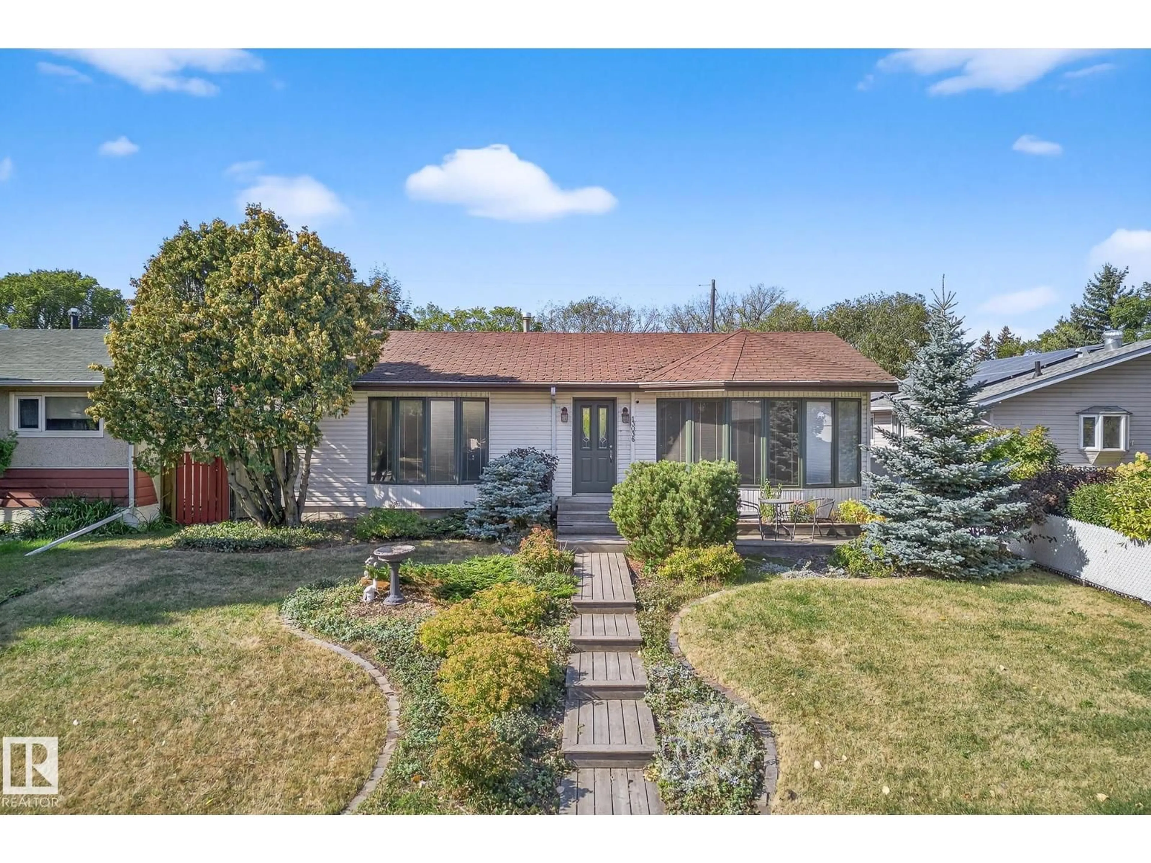 Home with brick exterior material, street for 13036 123 ST, Edmonton Alberta T5L0J7