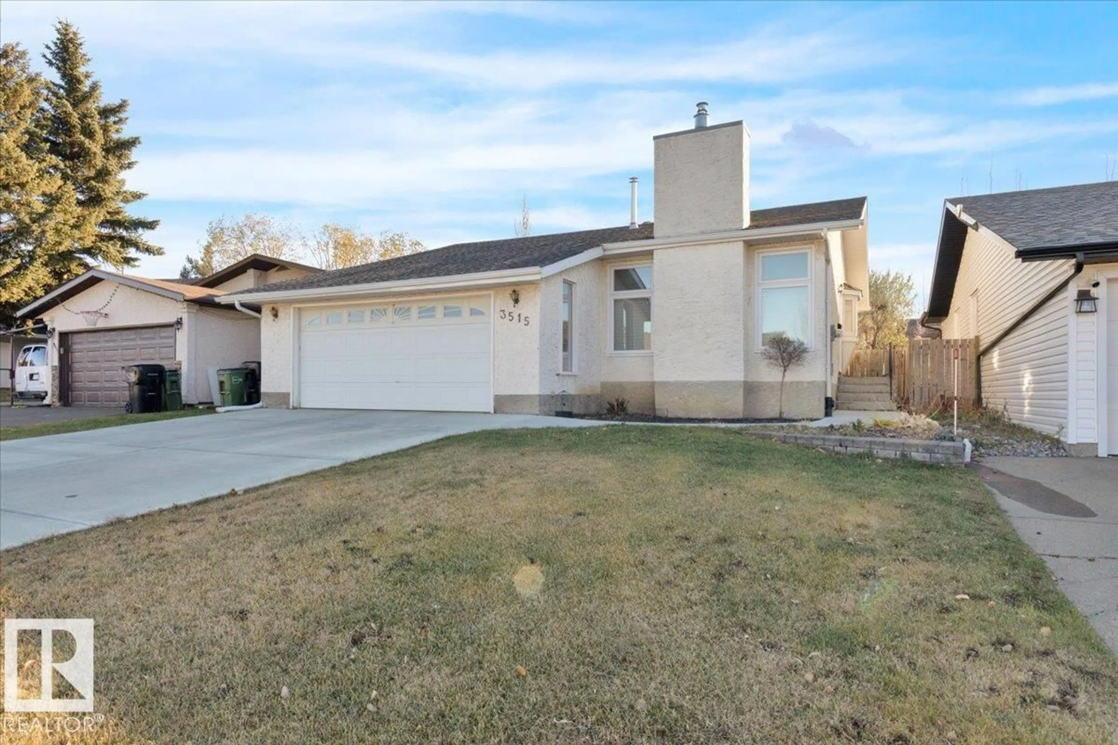 Home with vinyl exterior material, street for 3515 20 AV, Edmonton Alberta T6L3E2