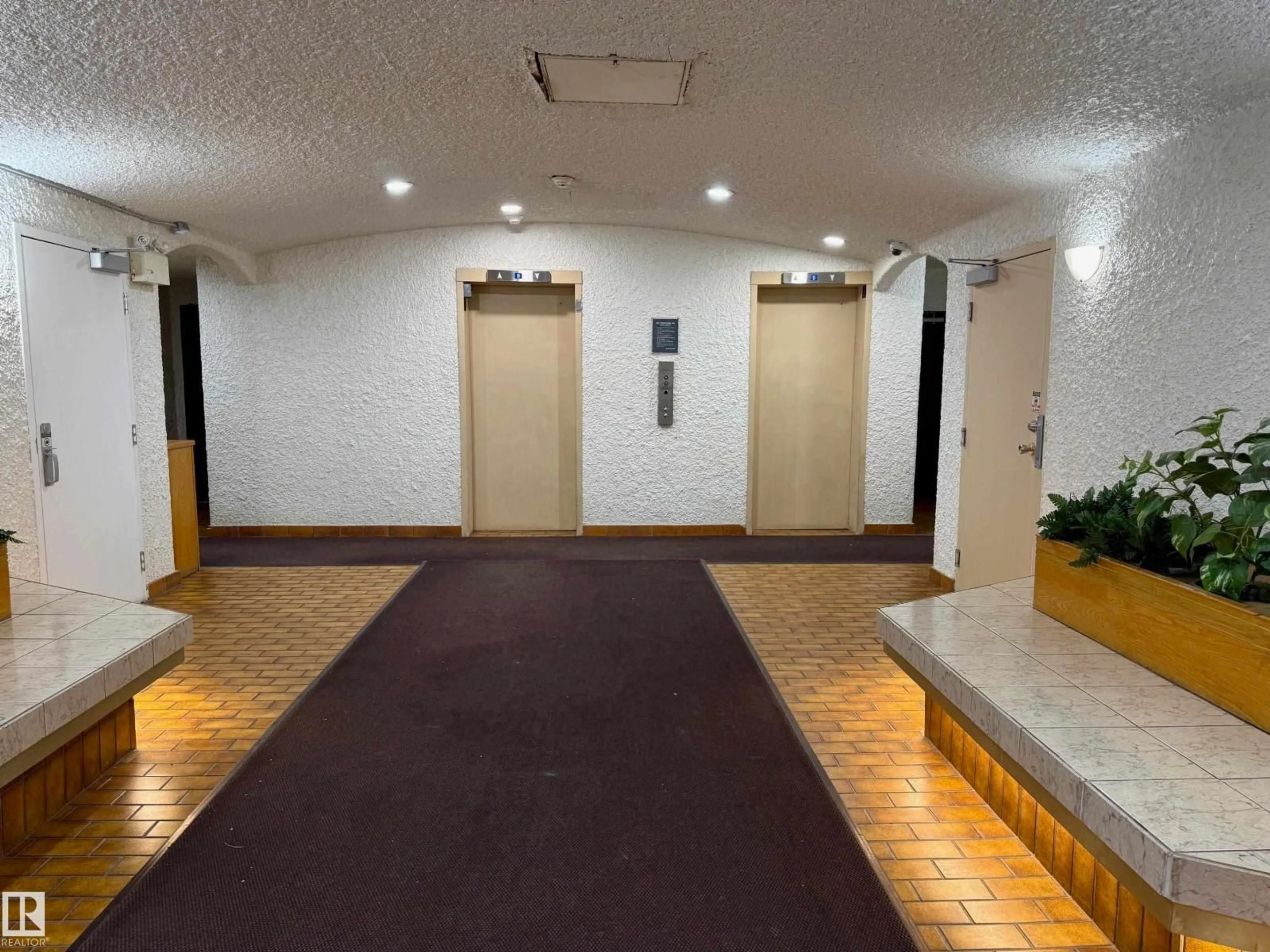 Indoor foyer for 603 - 9028 JASPER AV, Edmonton Alberta T5H3Y6