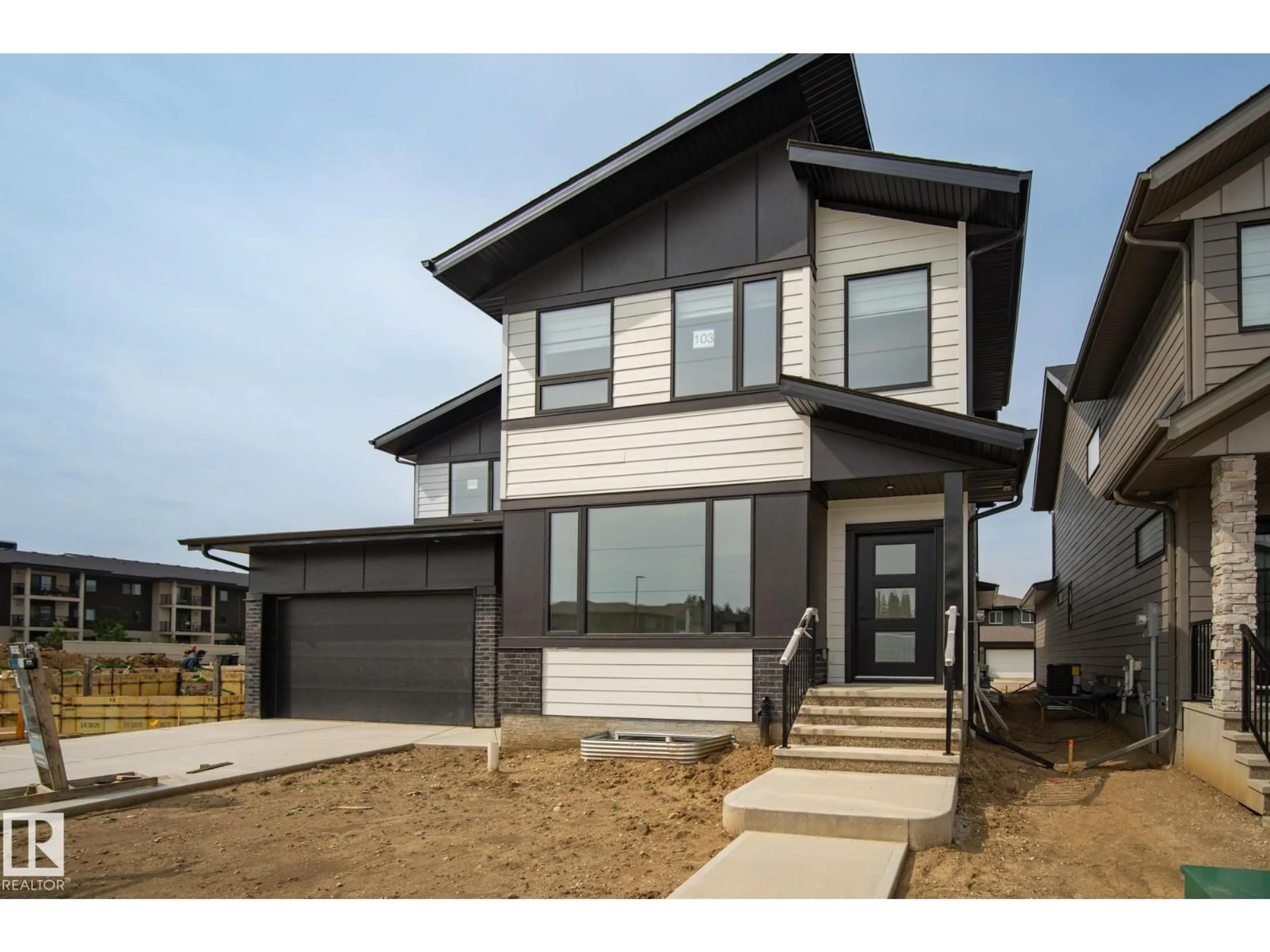 Home with vinyl exterior material, street for 103 NEWBURY CI, Sherwood Park Alberta T8B0E8