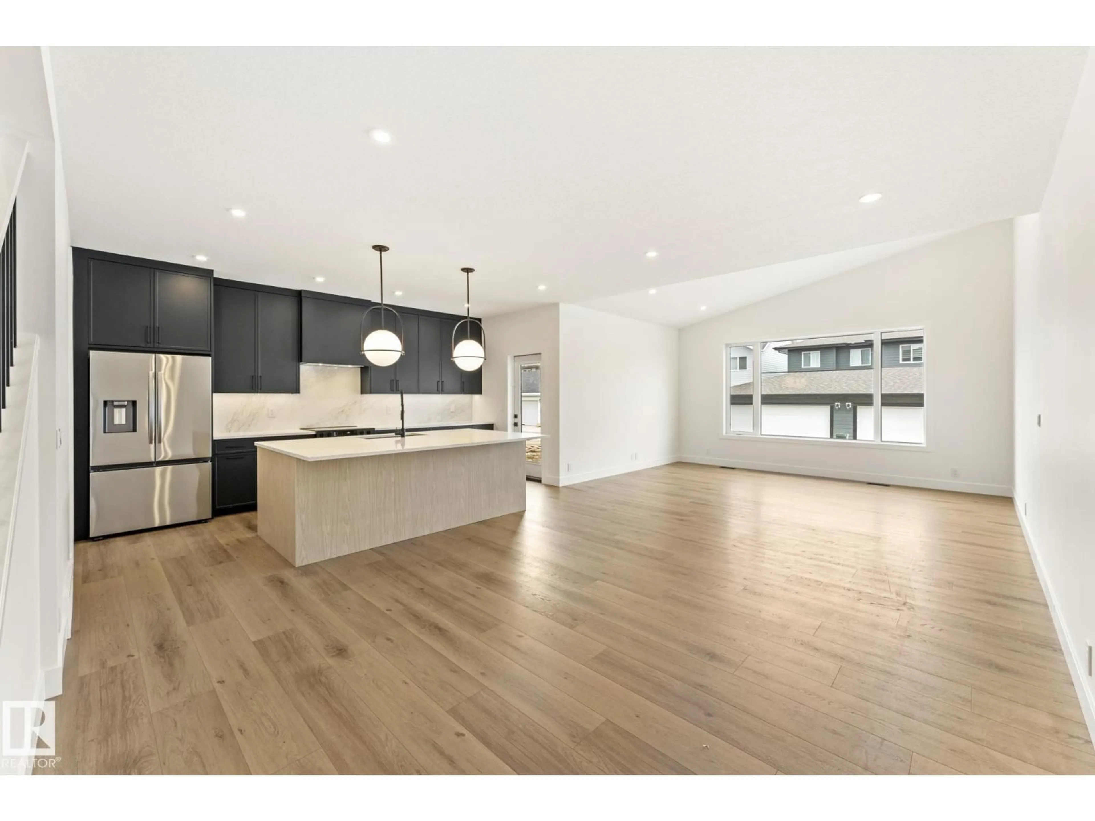Open concept kitchen, wood/laminate floor for 101 NEWBURY CI, Sherwood Park Alberta T8B0E8