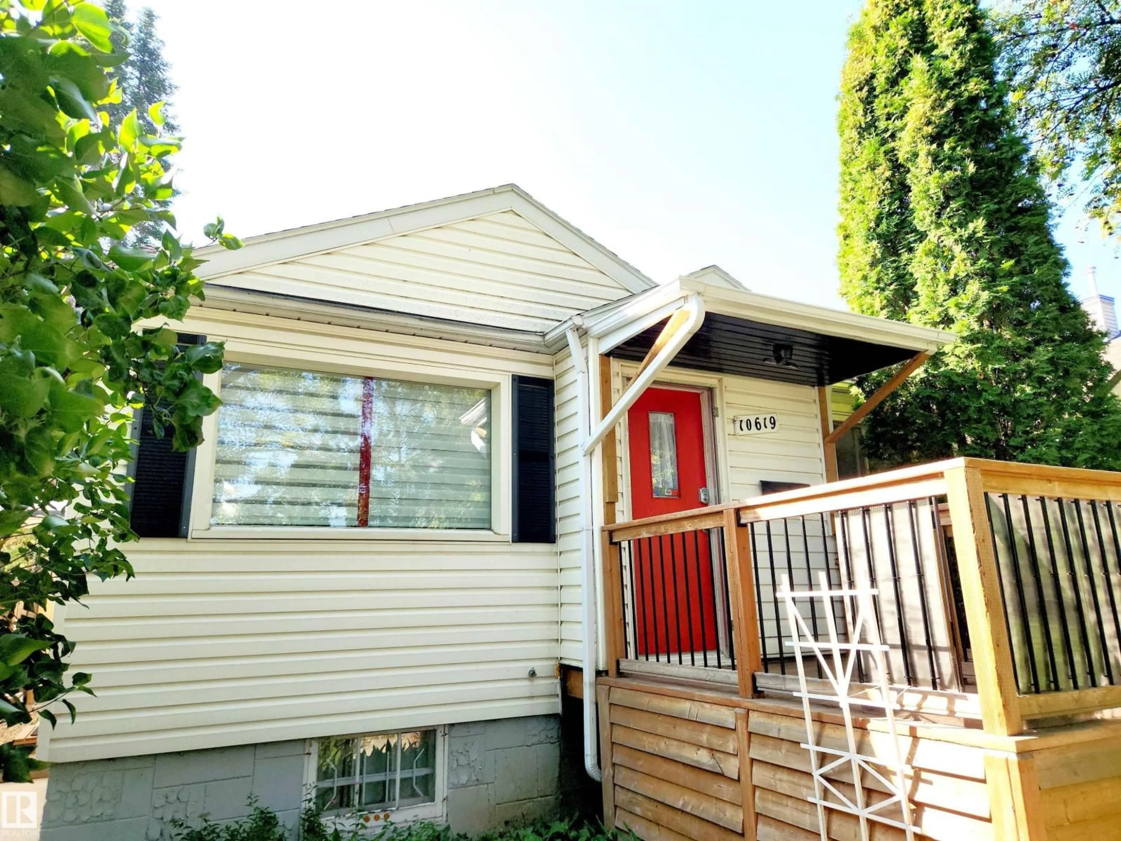 Home with vinyl exterior material, street for 10619 72 AV, Edmonton Alberta T6E0Z8