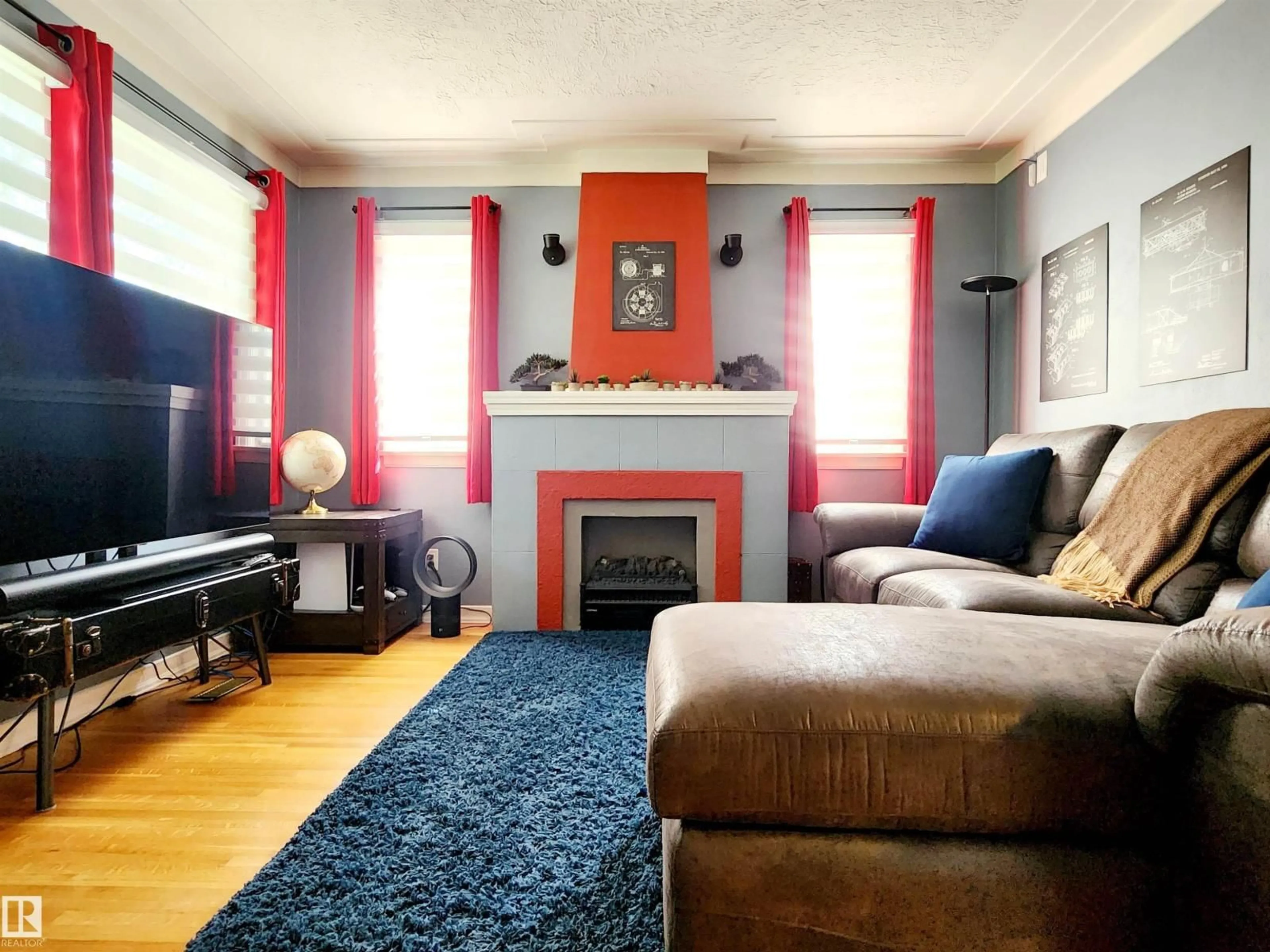 Living room with furniture, unknown for 10619 72 AV, Edmonton Alberta T6E0Z8