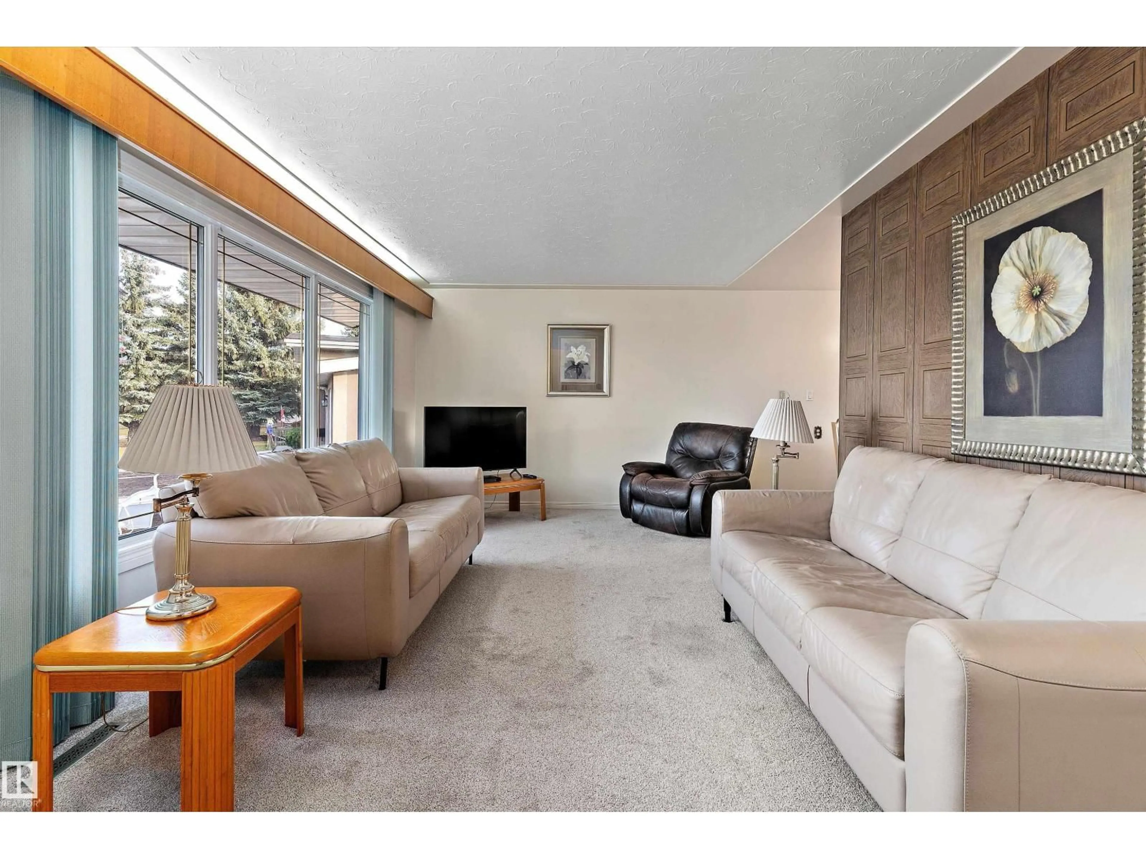 Living room with furniture, unknown for 13219 136A AV NW, Edmonton Alberta T5L4B7