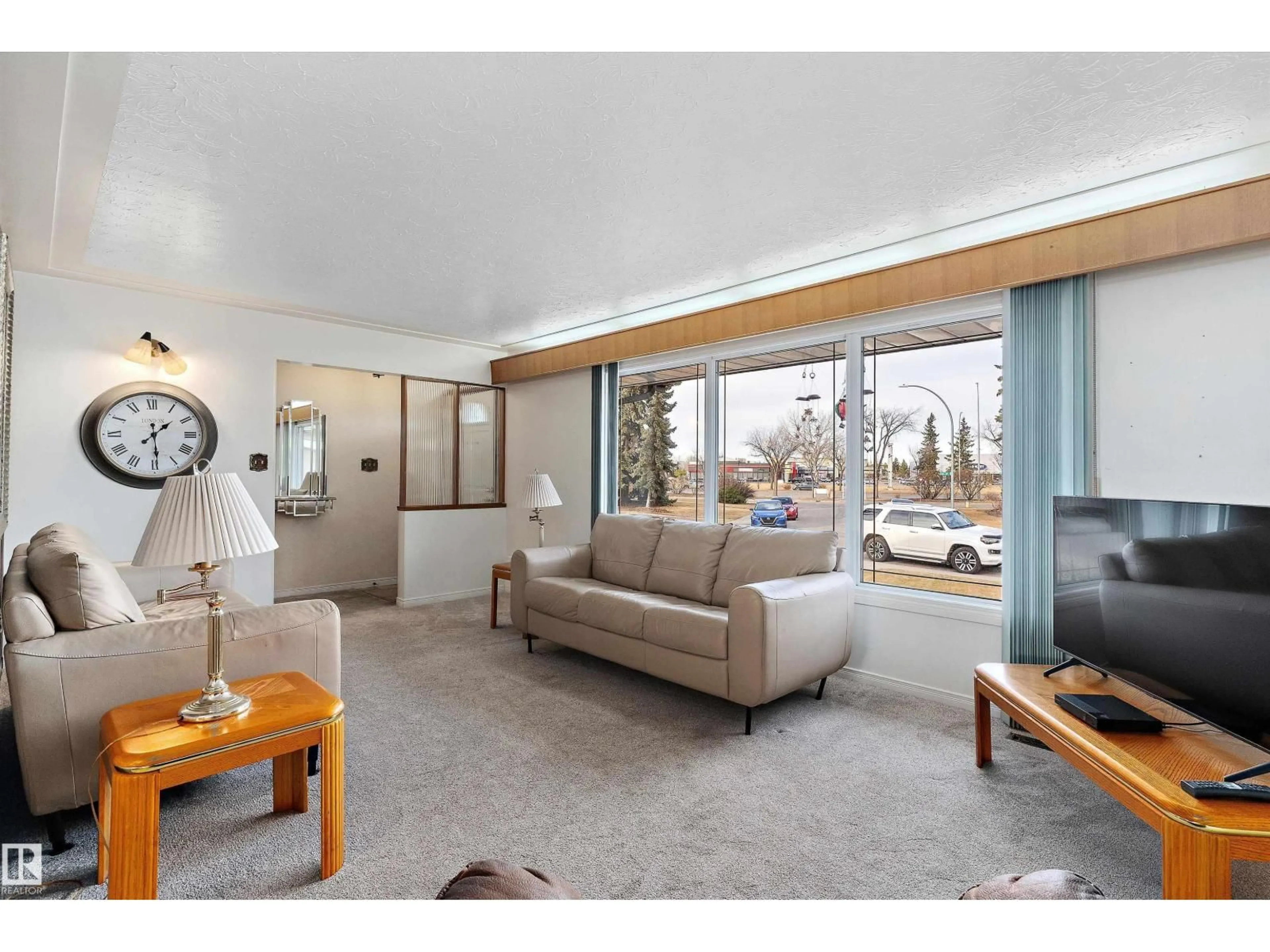 Living room with furniture, unknown for 13219 136A AV NW, Edmonton Alberta T5L4B7