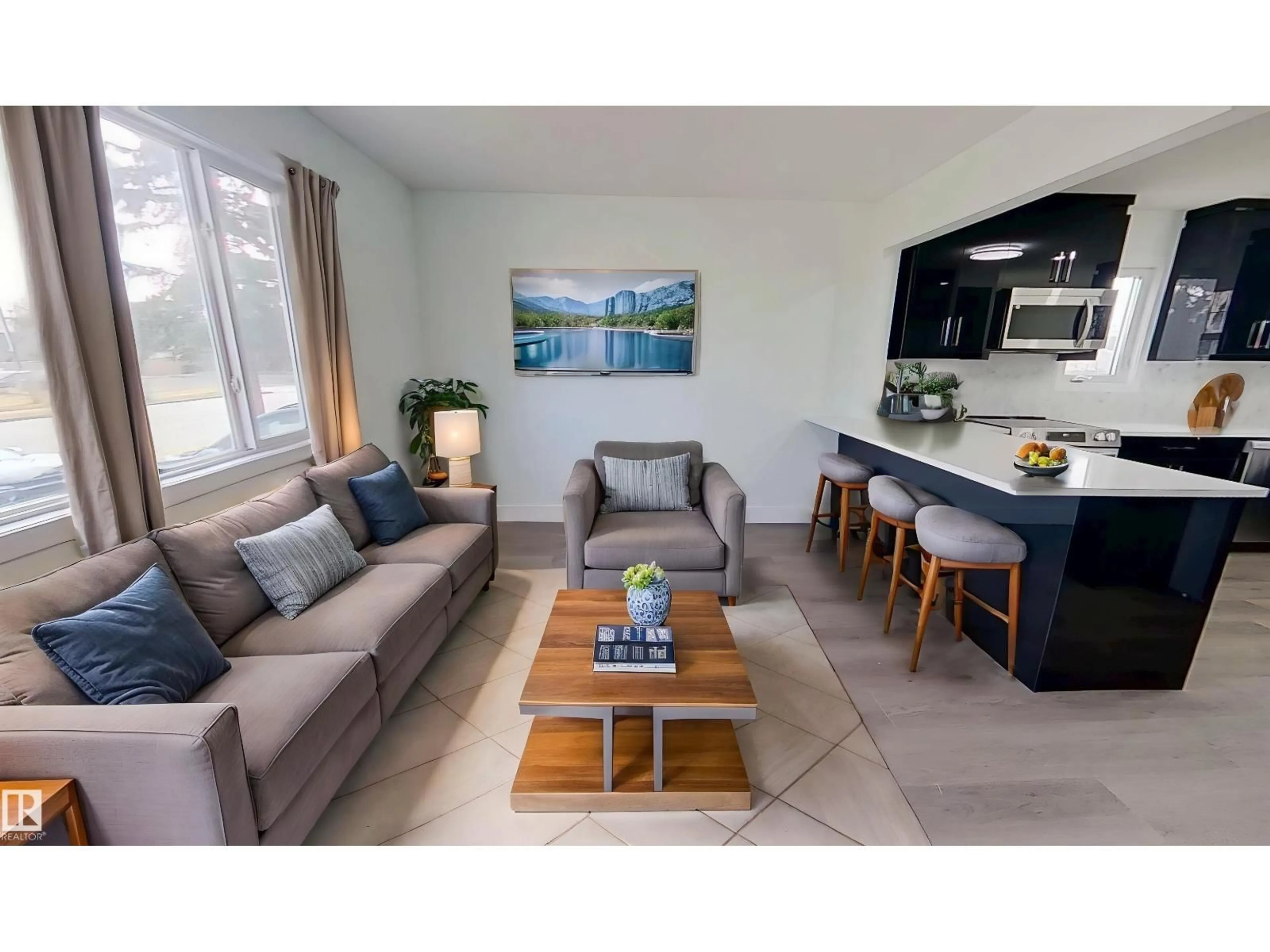 Living room with furniture, wood/laminate floor for NW - 10038 163 ST, Edmonton Alberta T5P3N4