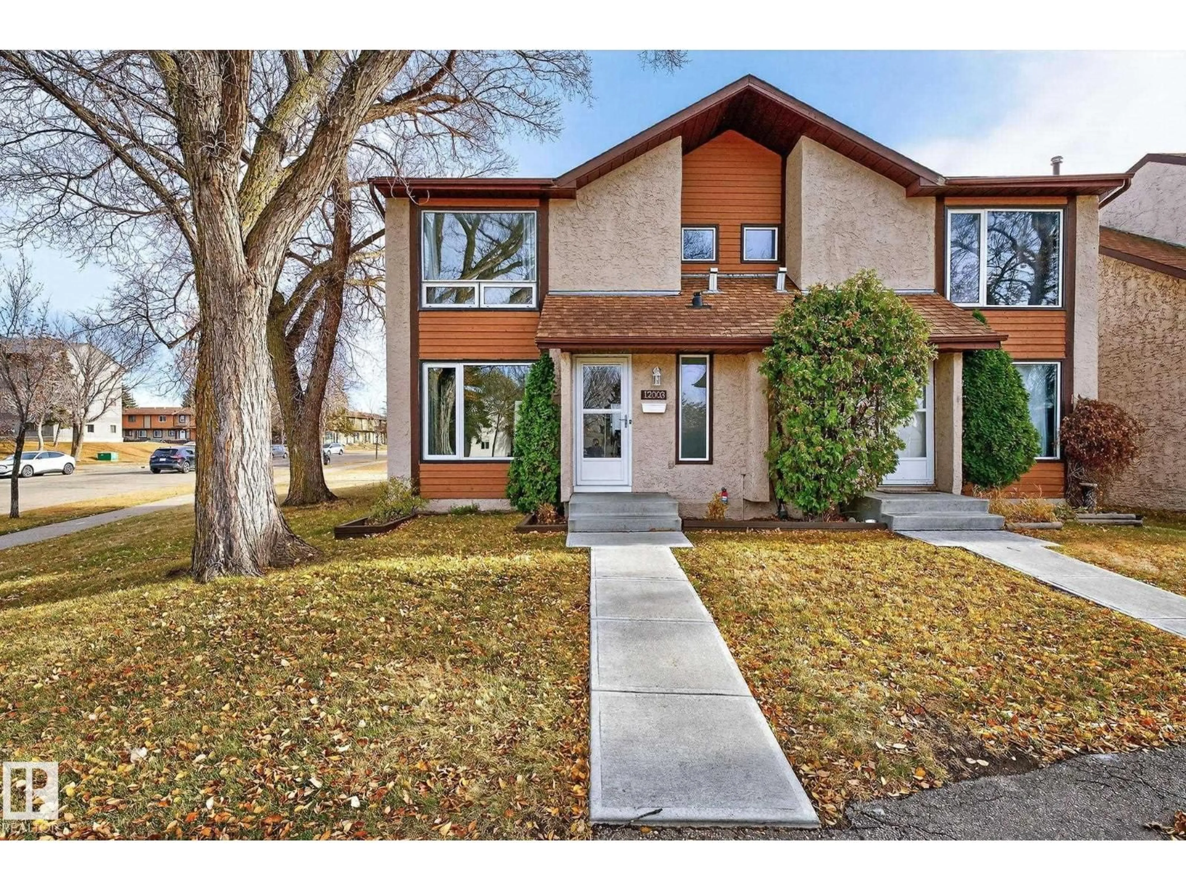 Home with brick exterior material, street for NW - 12003 162 AV, Edmonton Alberta T5X3R1