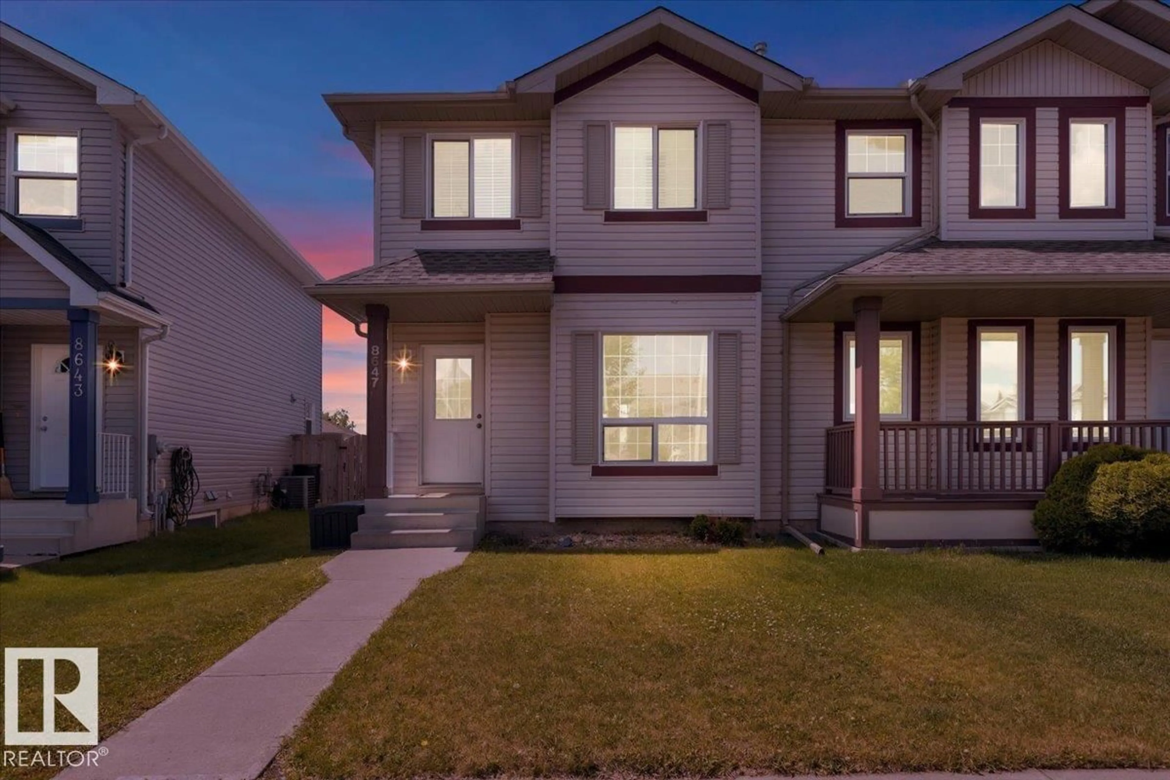 Home with vinyl exterior material, street for NW - 8647 173 AV, Edmonton Alberta T5Z3W4