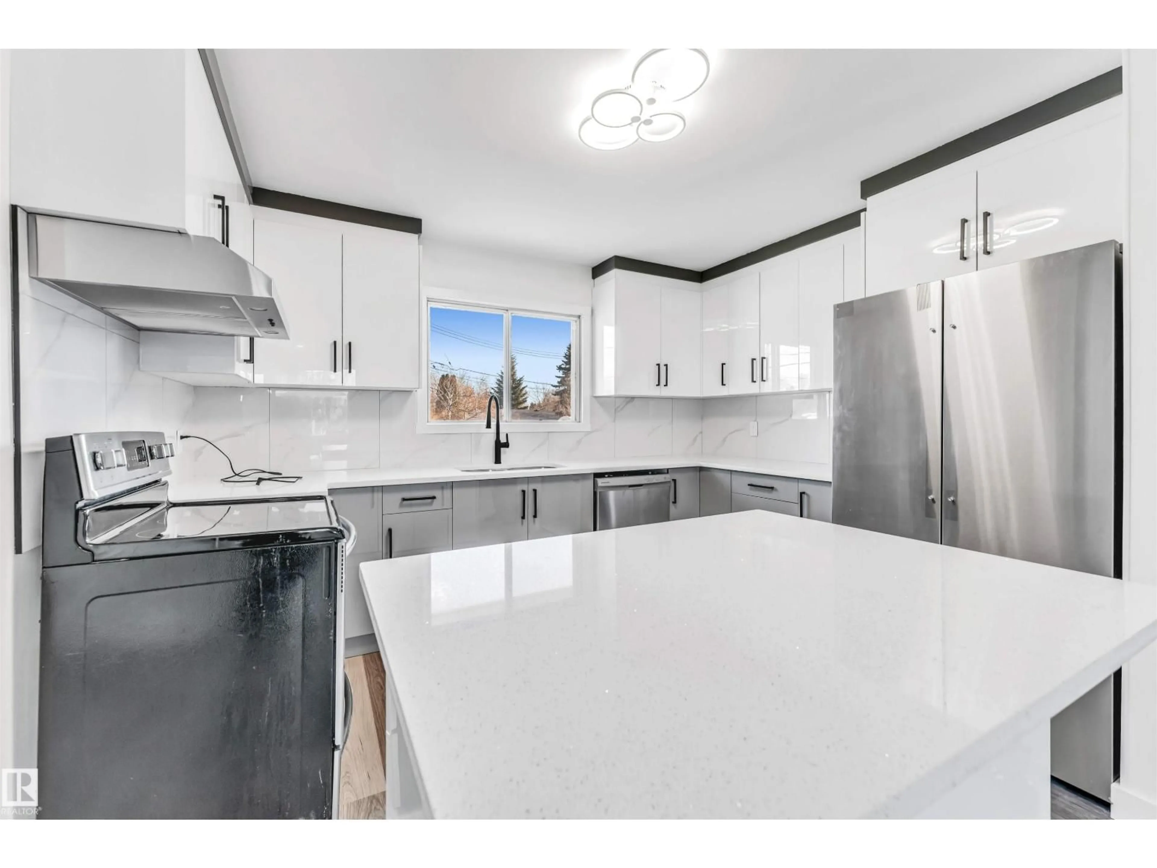 Open concept kitchen, ceramic/tile floor for 10751 164 ST, Edmonton Alberta T5P3S1