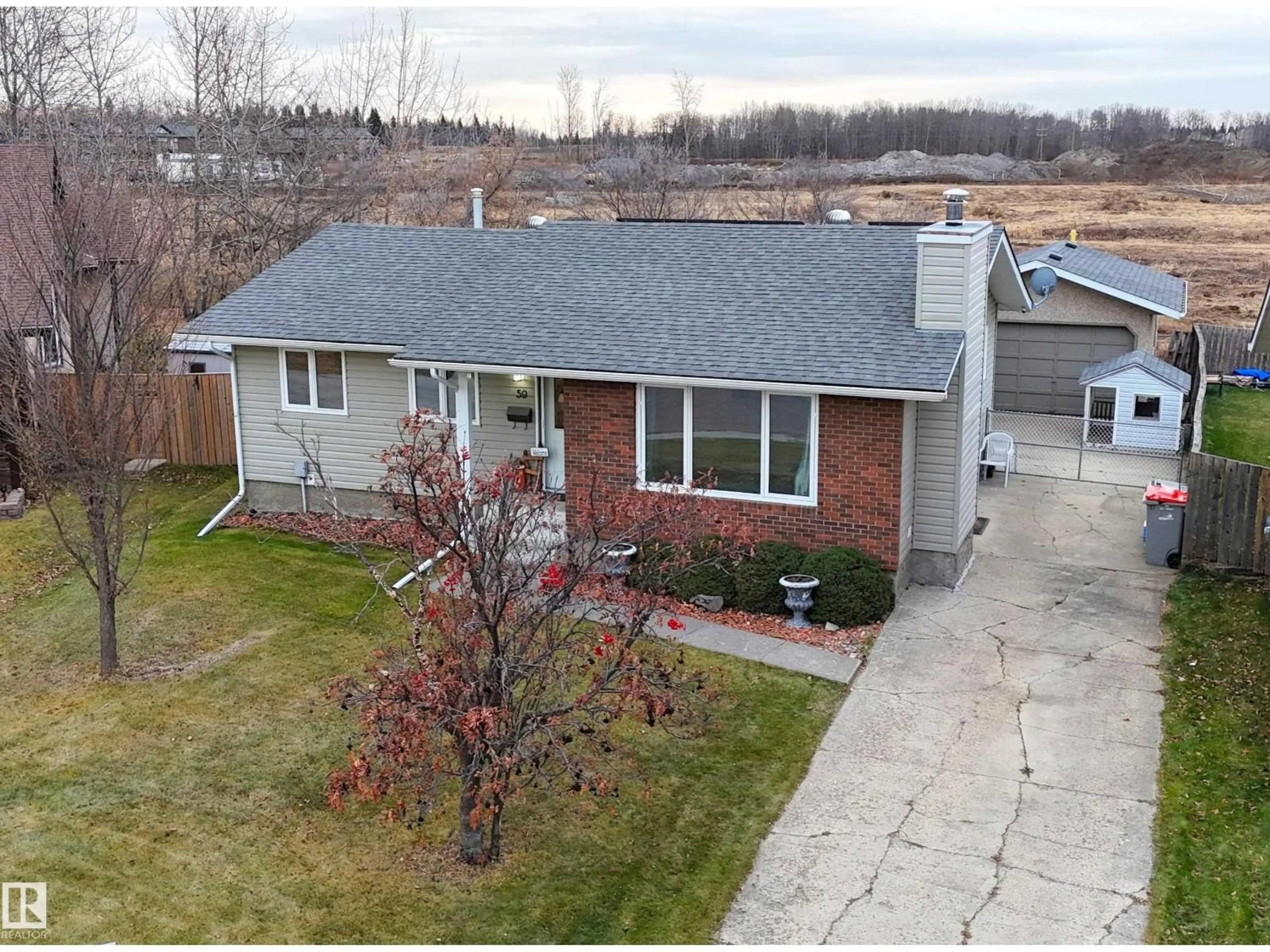 A pic from outside/outdoor area/front of a property/back of a property/a pic from drone, street for 59 GARDEN VALLEY DR, Stony Plain Alberta T7Z1H4