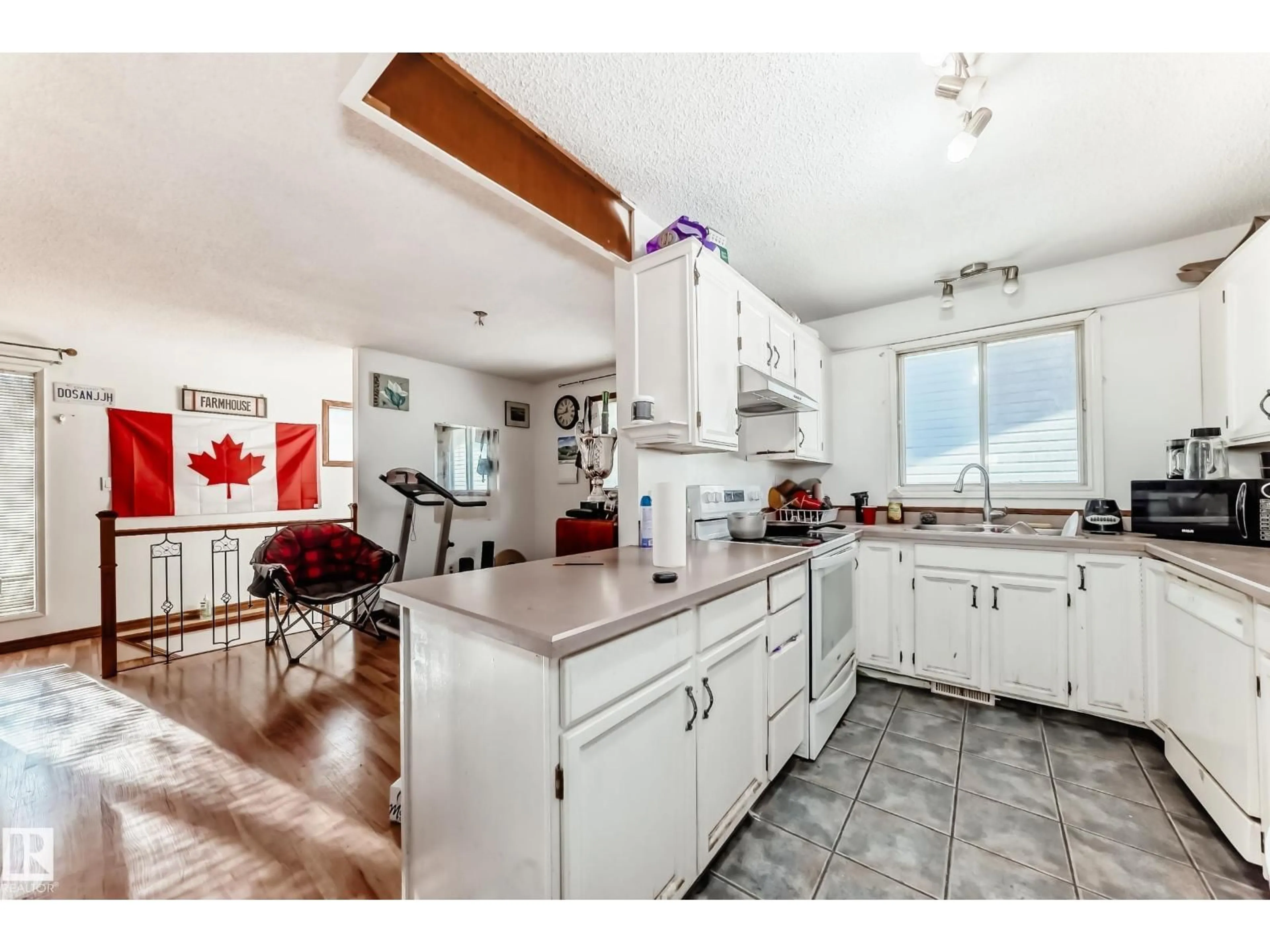 Open concept kitchen, unknown for 5144 37 AV, Edmonton Alberta T6L1C8