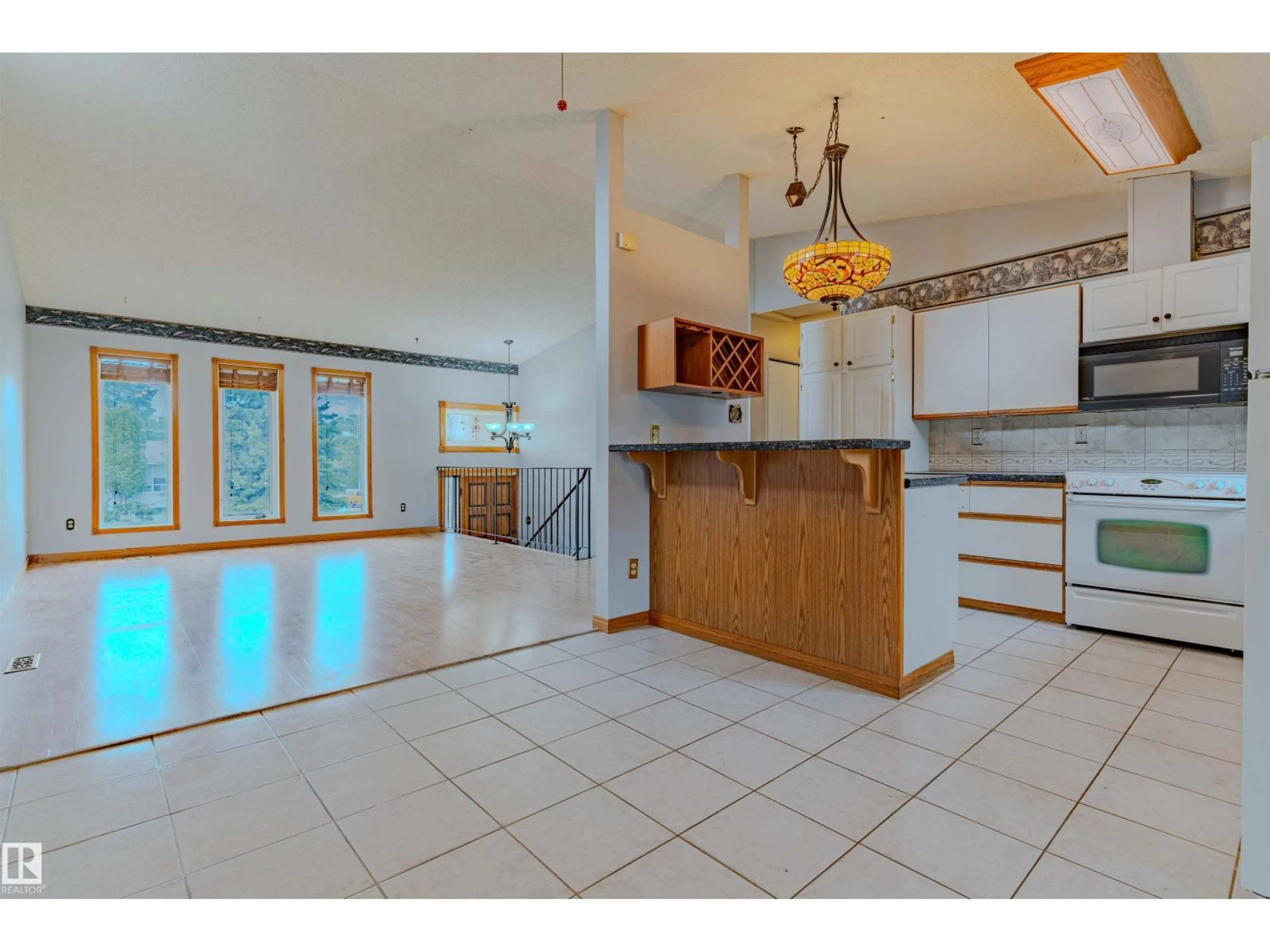 Open concept kitchen, ceramic/tile floor for 1353 39 ST, Edmonton Alberta T6L2M6