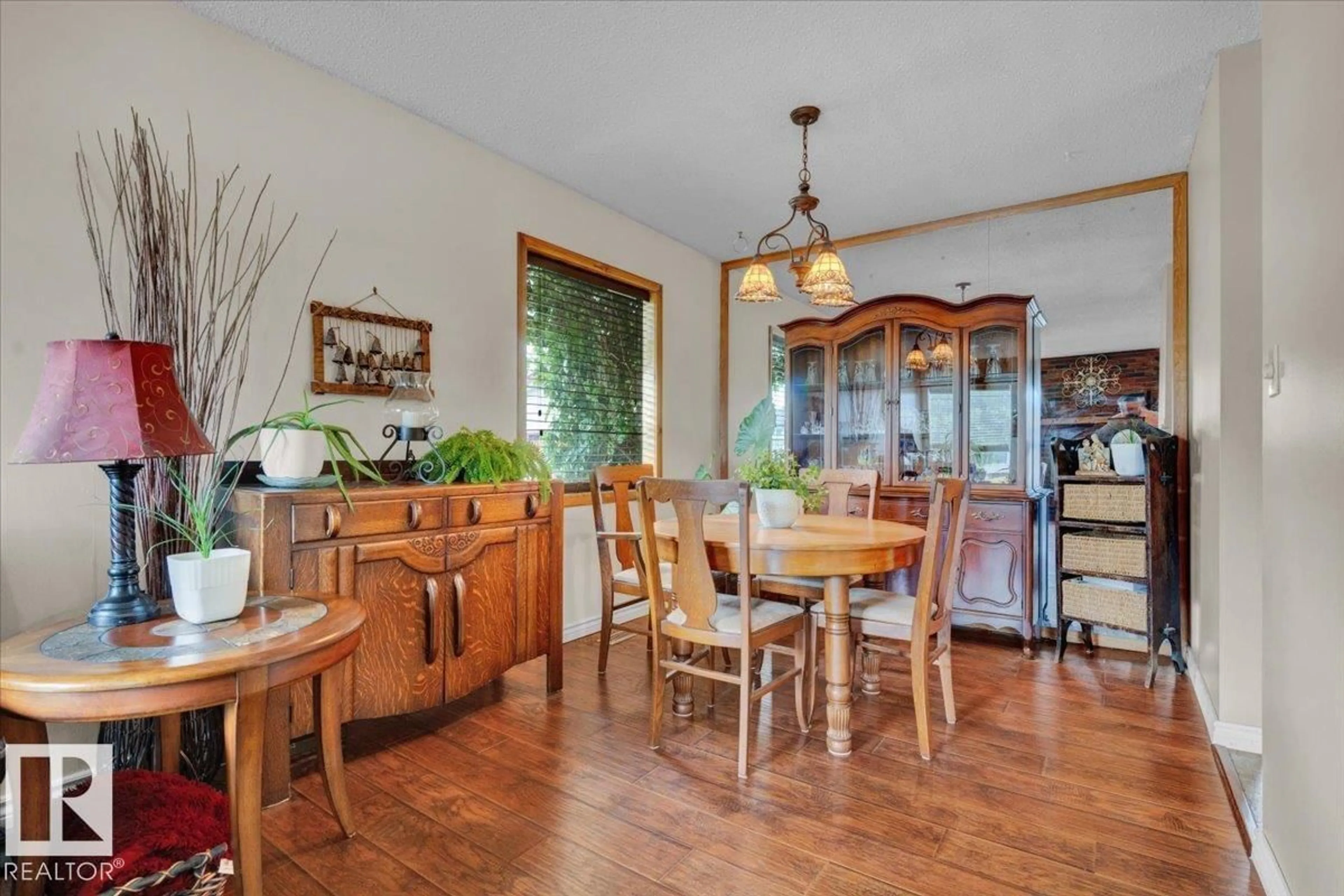 Dining room, wood/laminate floor for 10217 167A AV, Edmonton Alberta T5X2Y8