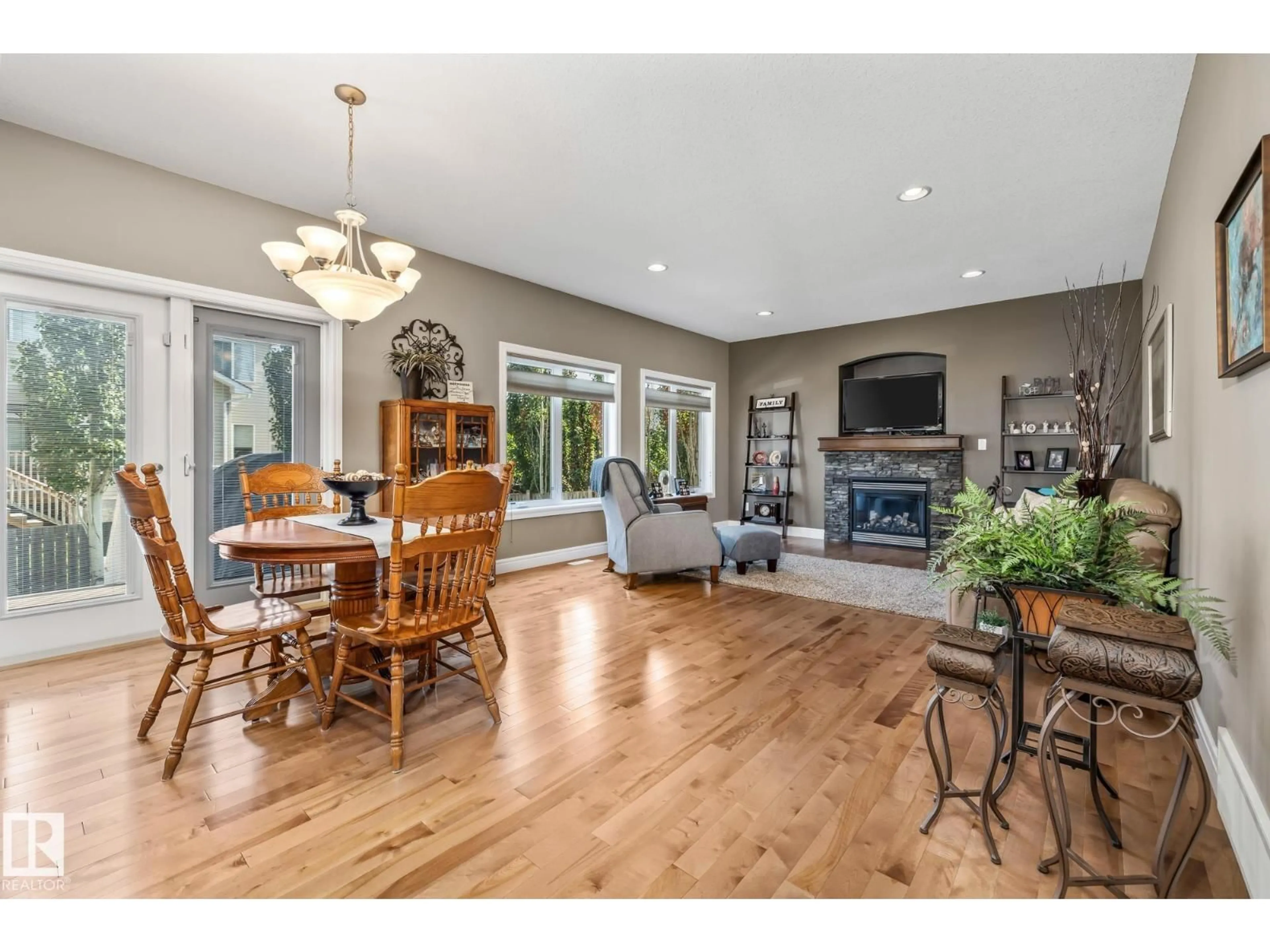 Open concept kitchen, wood/laminate floor for 39 HILLSIDE TC, Fort Saskatchewan Alberta T8L0E4