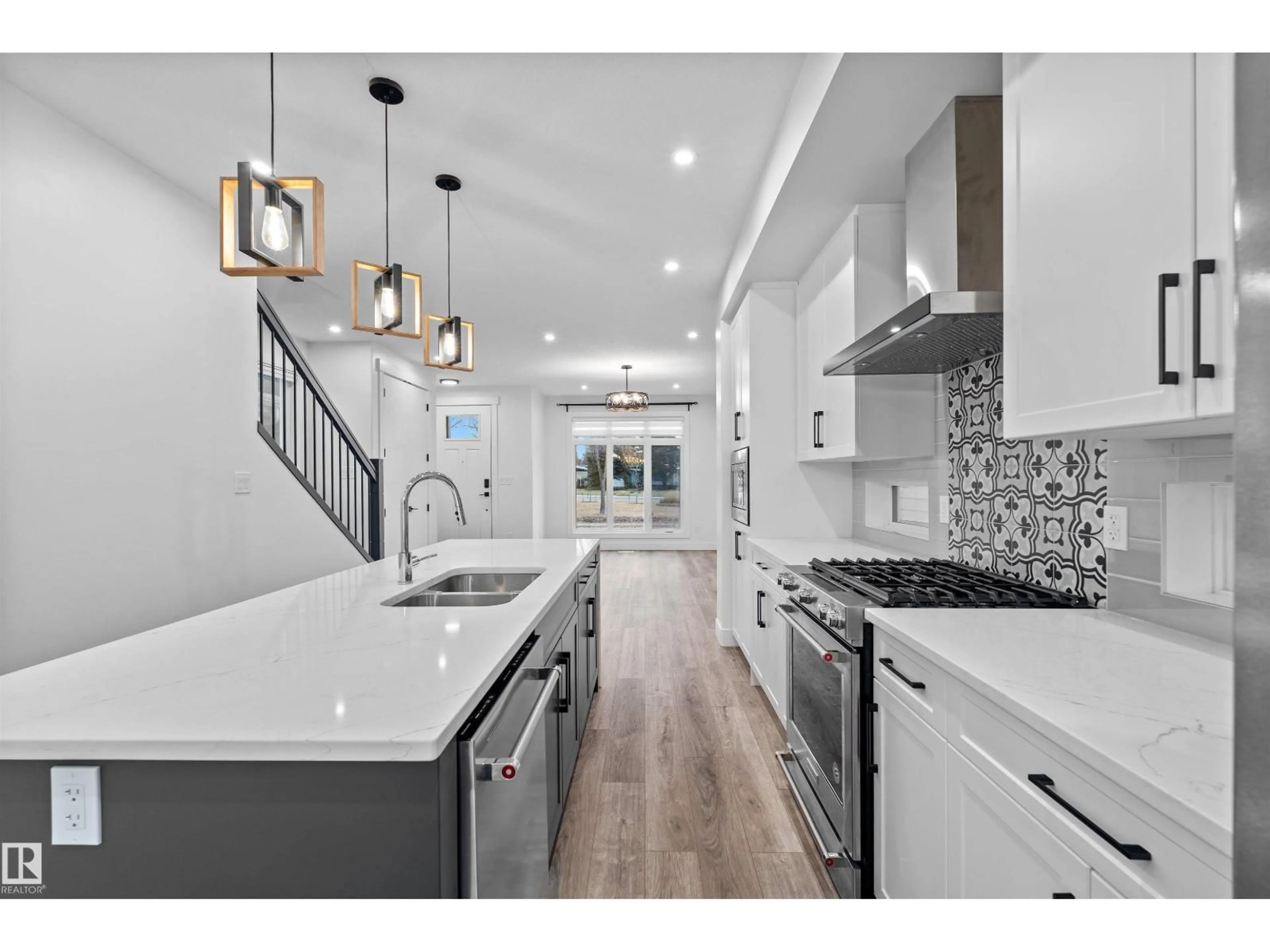 Open concept kitchen, ceramic/tile floor for 11228 48 AV, Edmonton Alberta T6H0C7