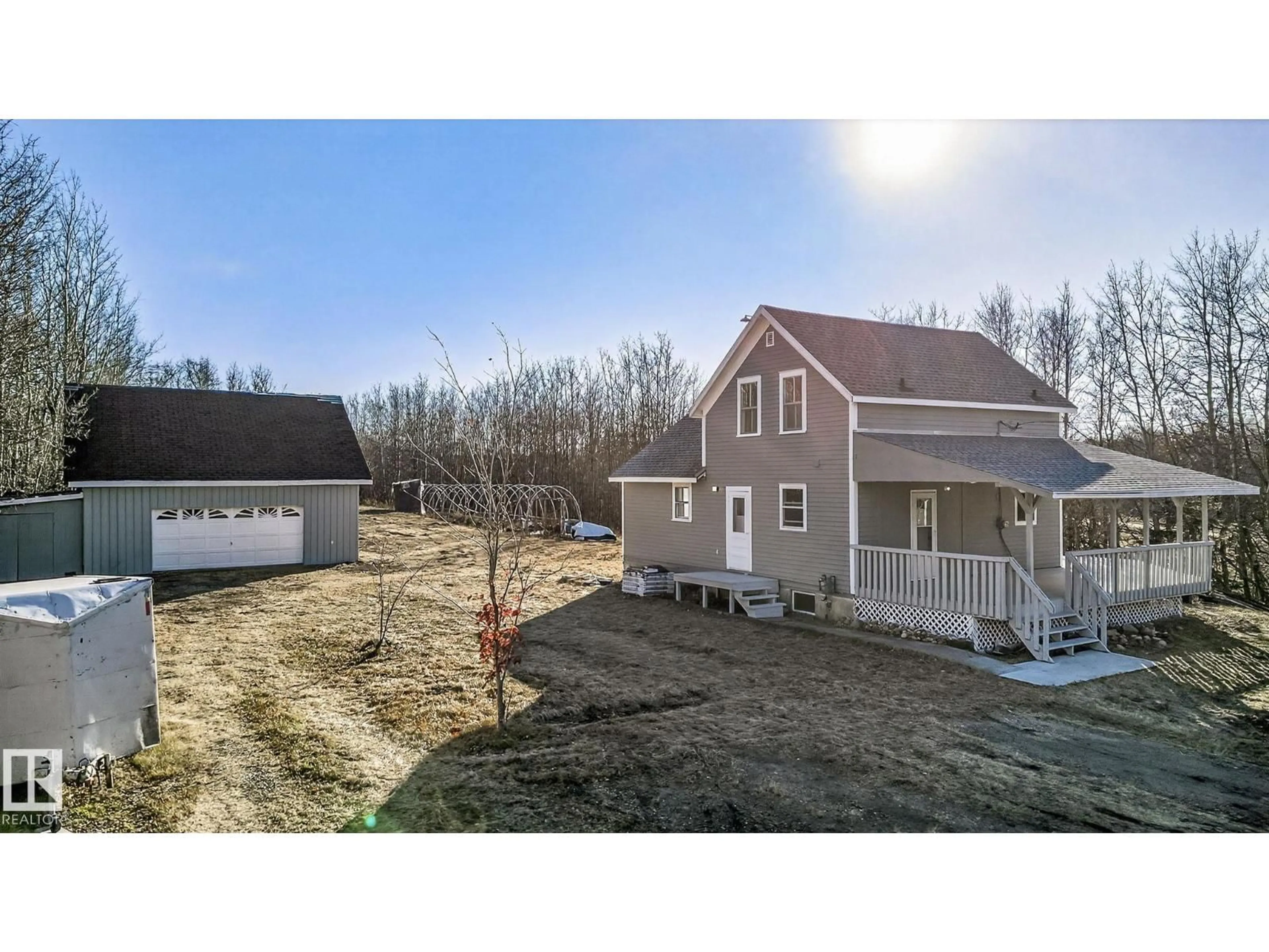 A pic from outside/outdoor area/front of a property/back of a property/a pic from drone, unknown for 49551 RANGE ROAD 202, Rural Camrose County Alberta T0B0C0