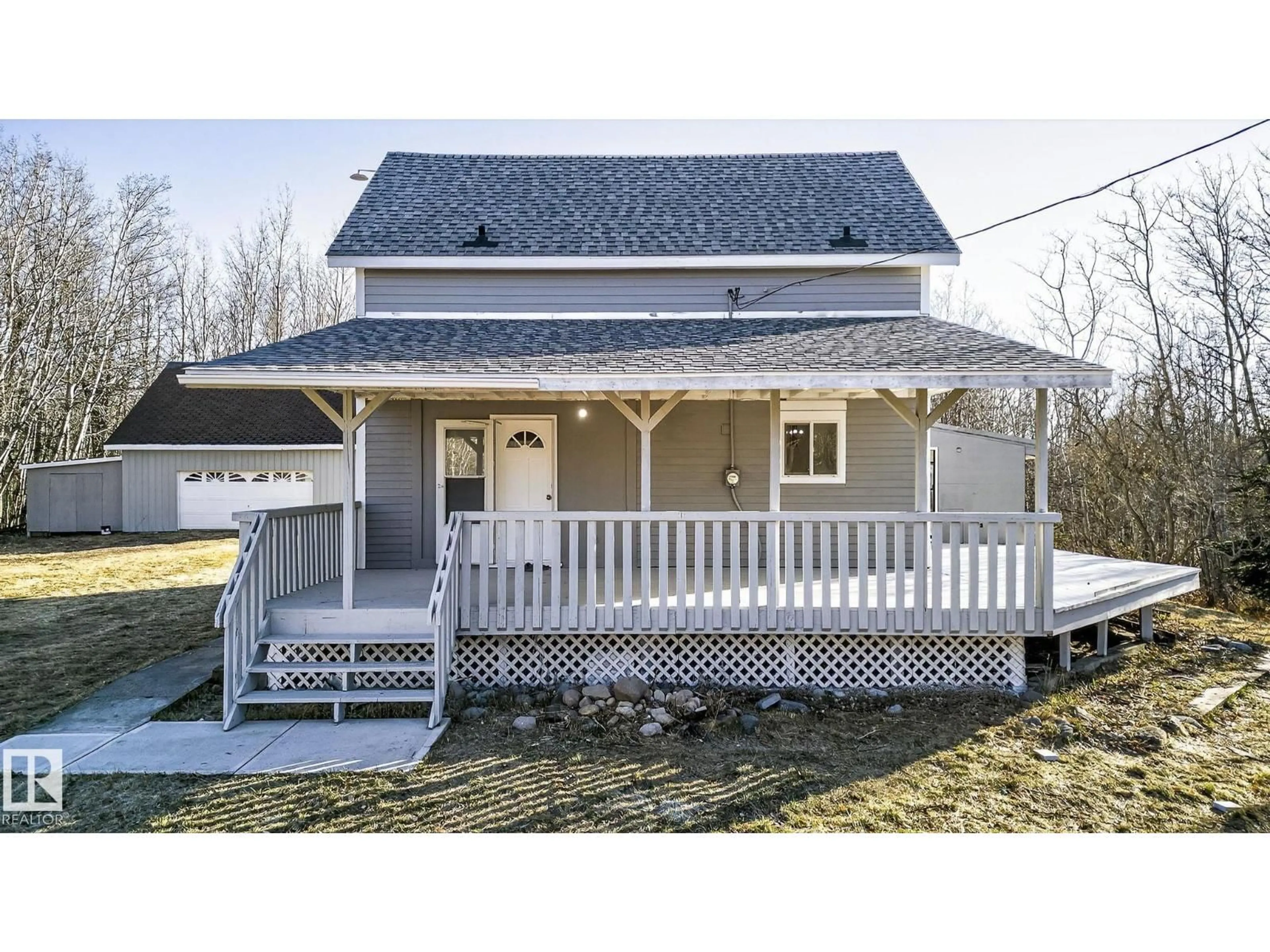 Home with vinyl exterior material, street for 49551 RANGE ROAD 202, Rural Camrose County Alberta T0B0C0