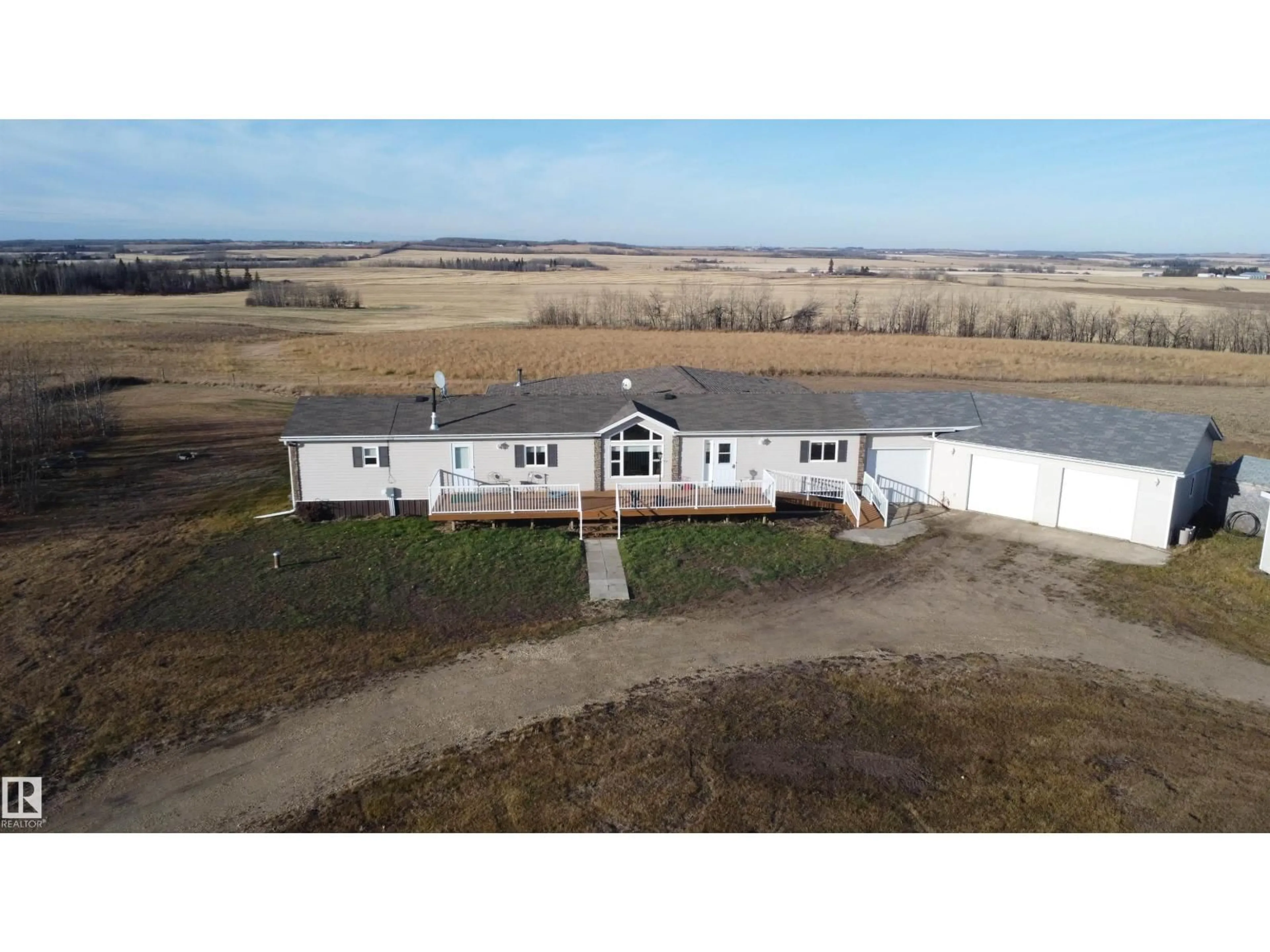 A pic from outside/outdoor area/front of a property/back of a property/a pic from drone, building for 58424B RG RD 274, Rural Westlock County Alberta T0G1W0