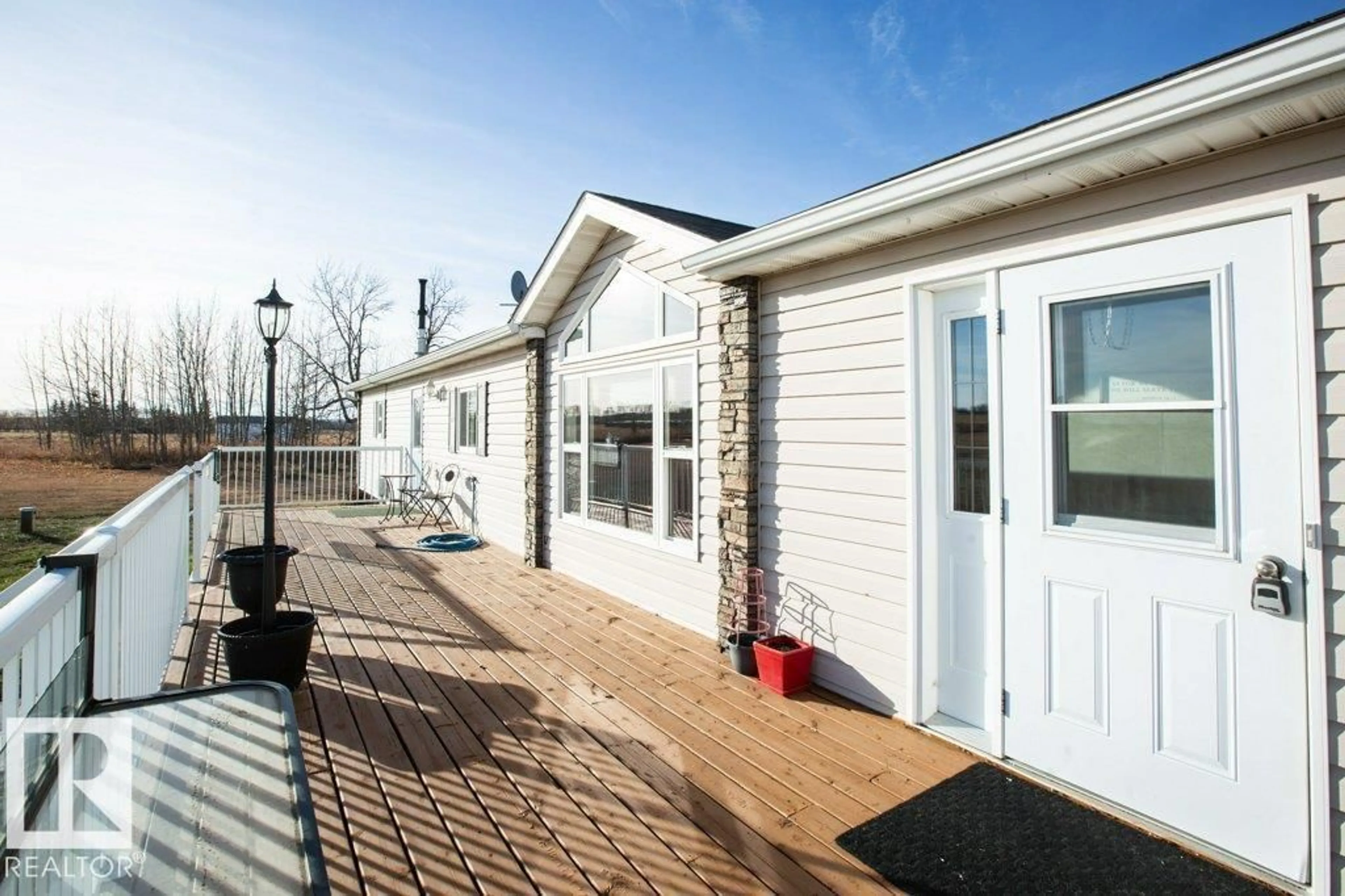 Home with vinyl exterior material, street for 58424B RG RD 274, Rural Westlock County Alberta T0G1W0