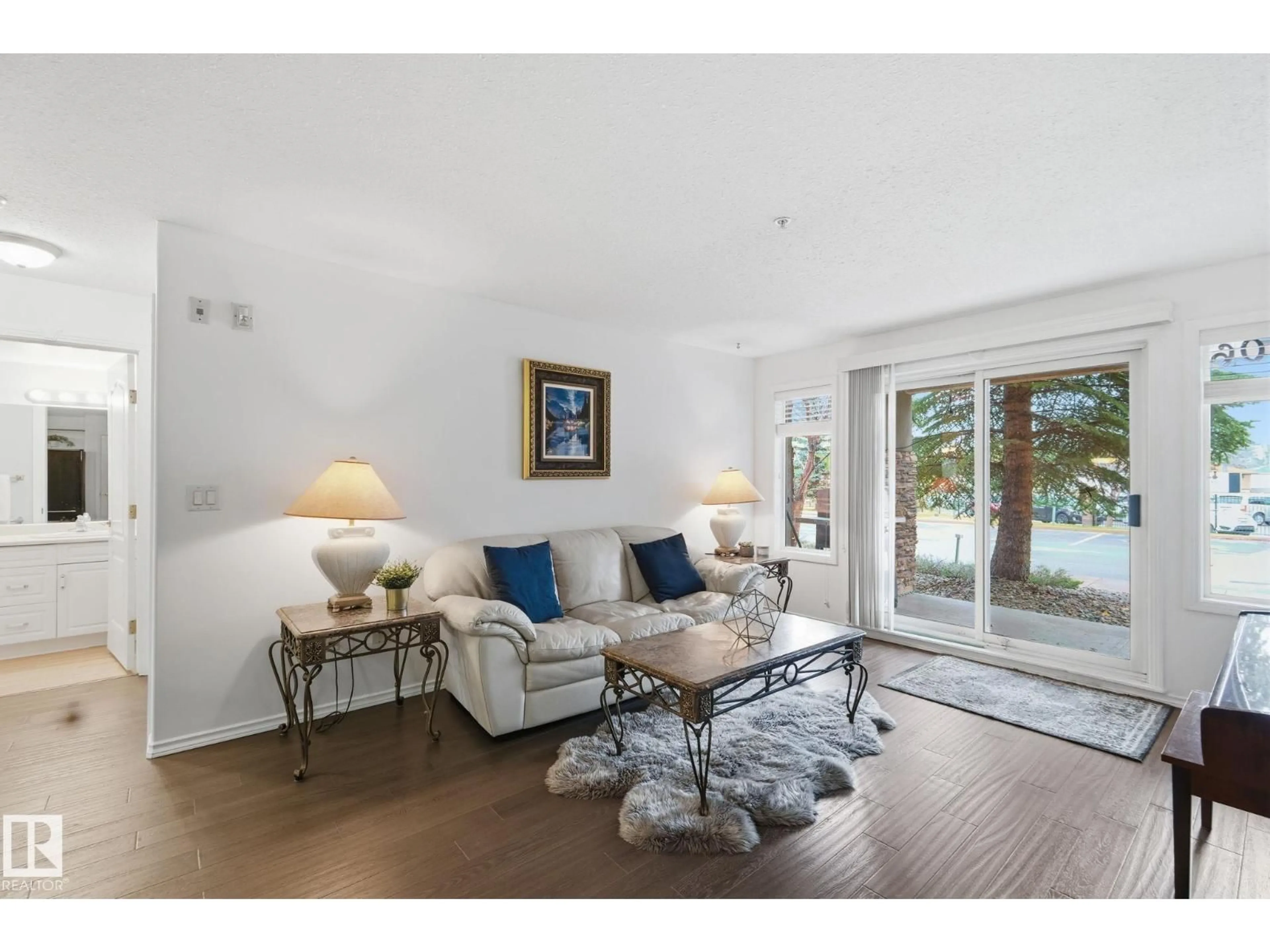 Living room with furniture, unknown for #106 - 8956 156 ST, Edmonton Alberta T5R5Z6