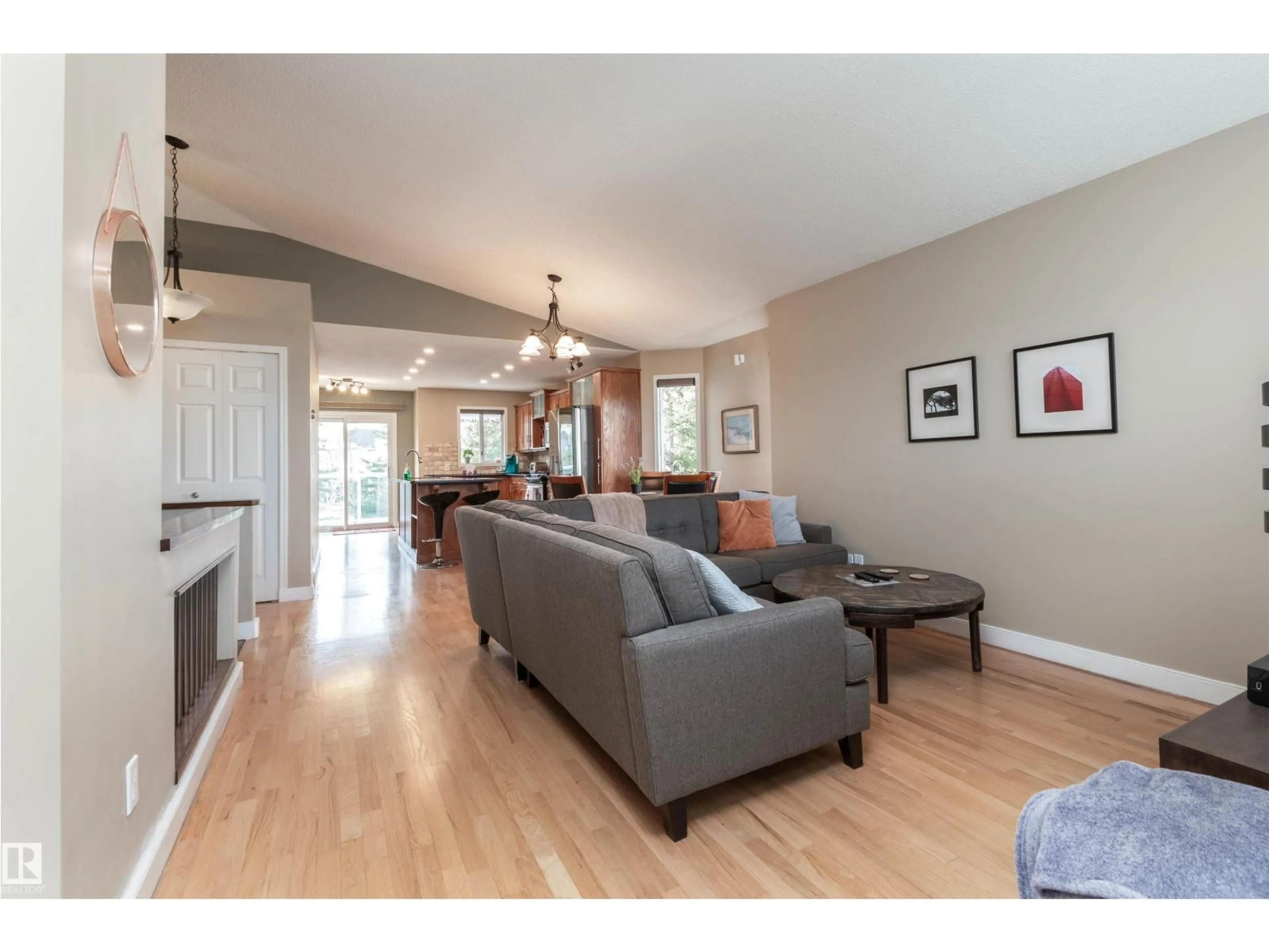 Living room with furniture, wood/laminate floor for 65 DAWSON DR, Sherwood Park Alberta T8H1T7
