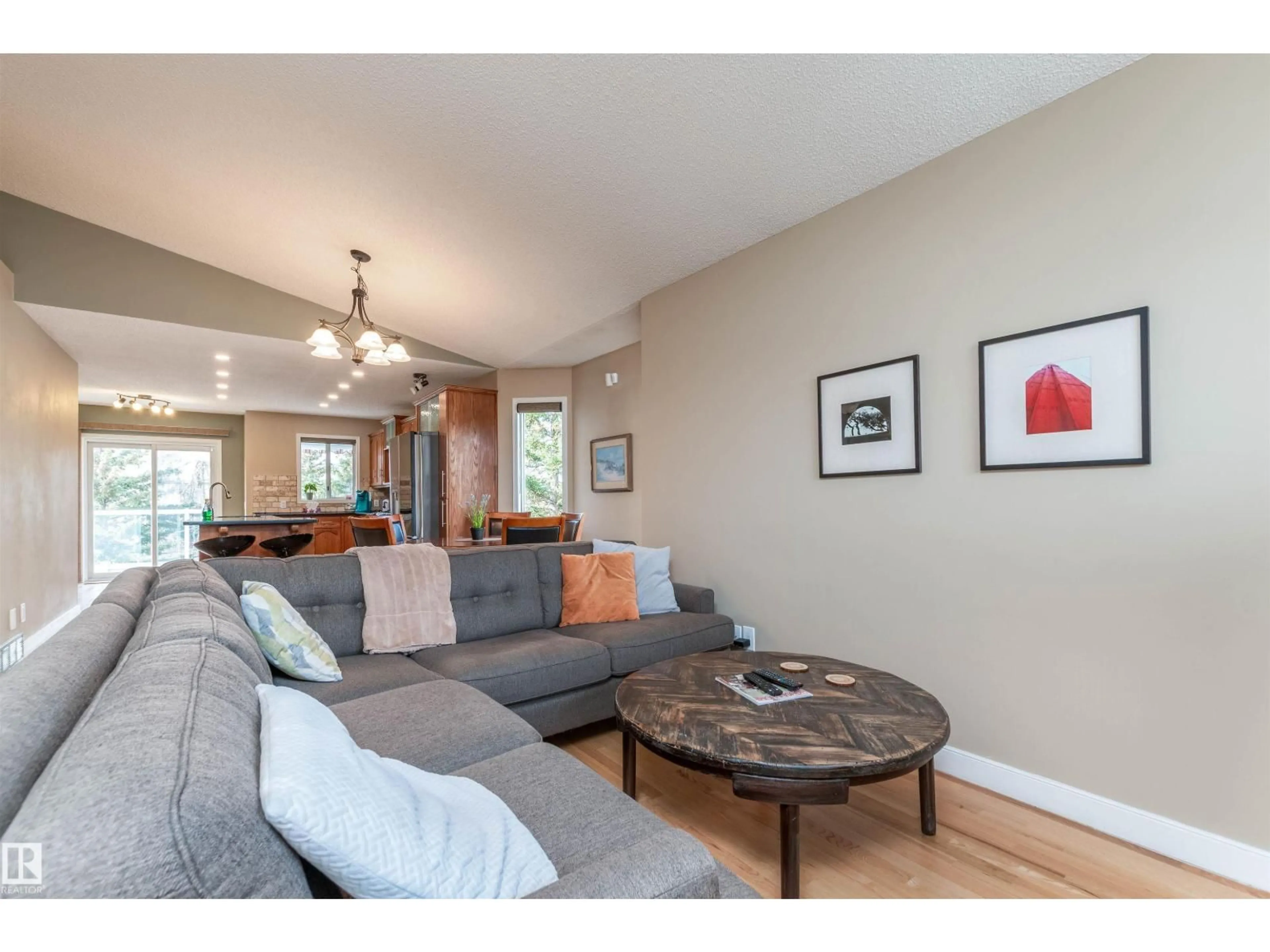 Living room with furniture, wood/laminate floor for 65 DAWSON DR, Sherwood Park Alberta T8H1T7