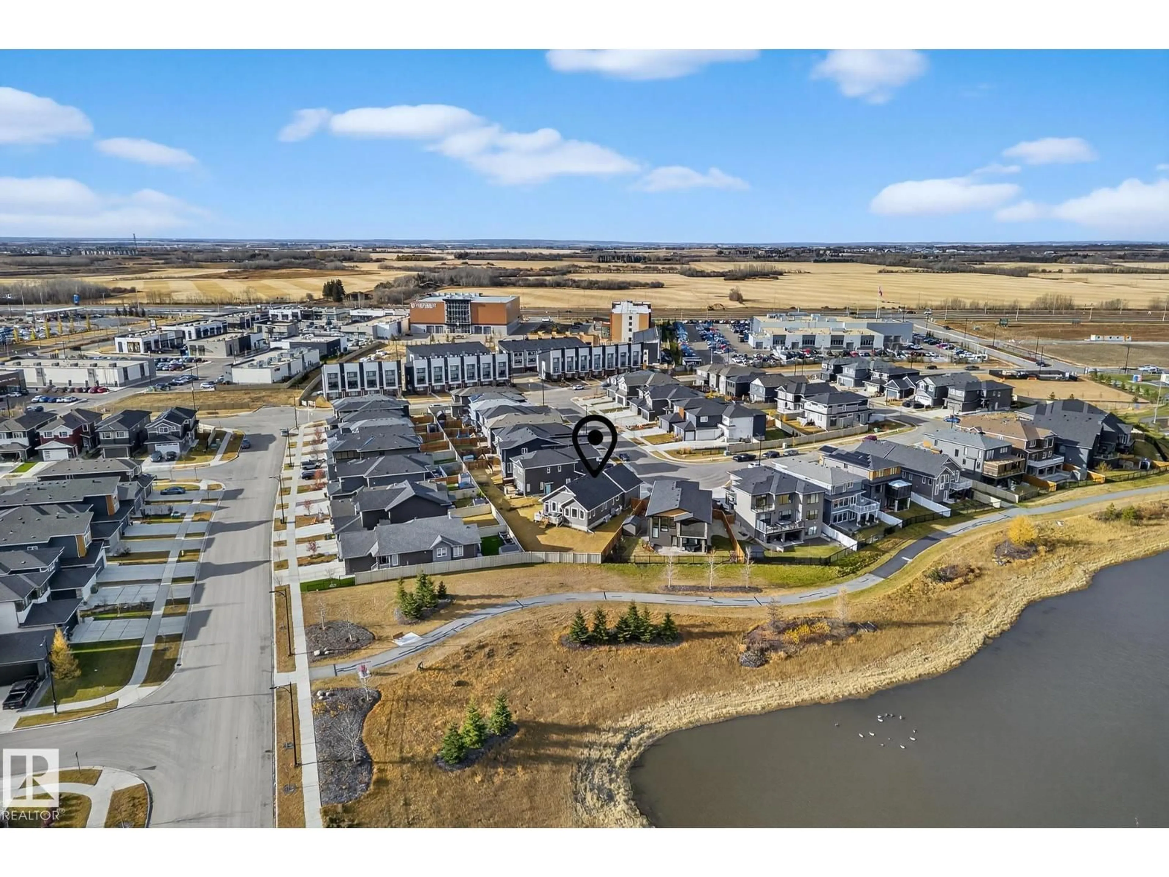 A pic from outside/outdoor area/front of a property/back of a property/a pic from drone, water/lake/river/ocean view for 17 EVERMORE CR, St. Albert Alberta T8N7W9