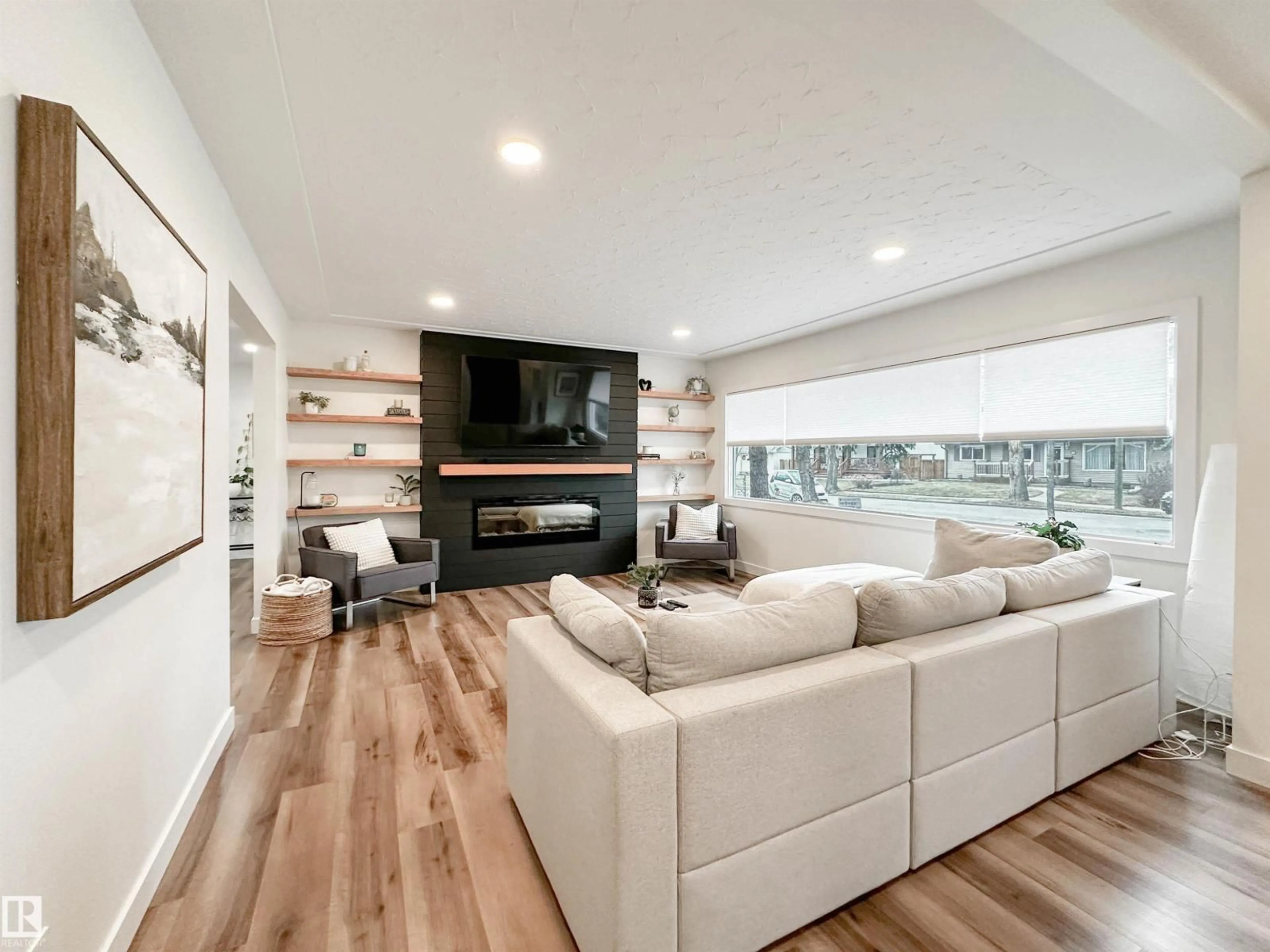 Living room with furniture, wood/laminate floor for 4 BALMORAL DR, St. Albert Alberta T8N0B8