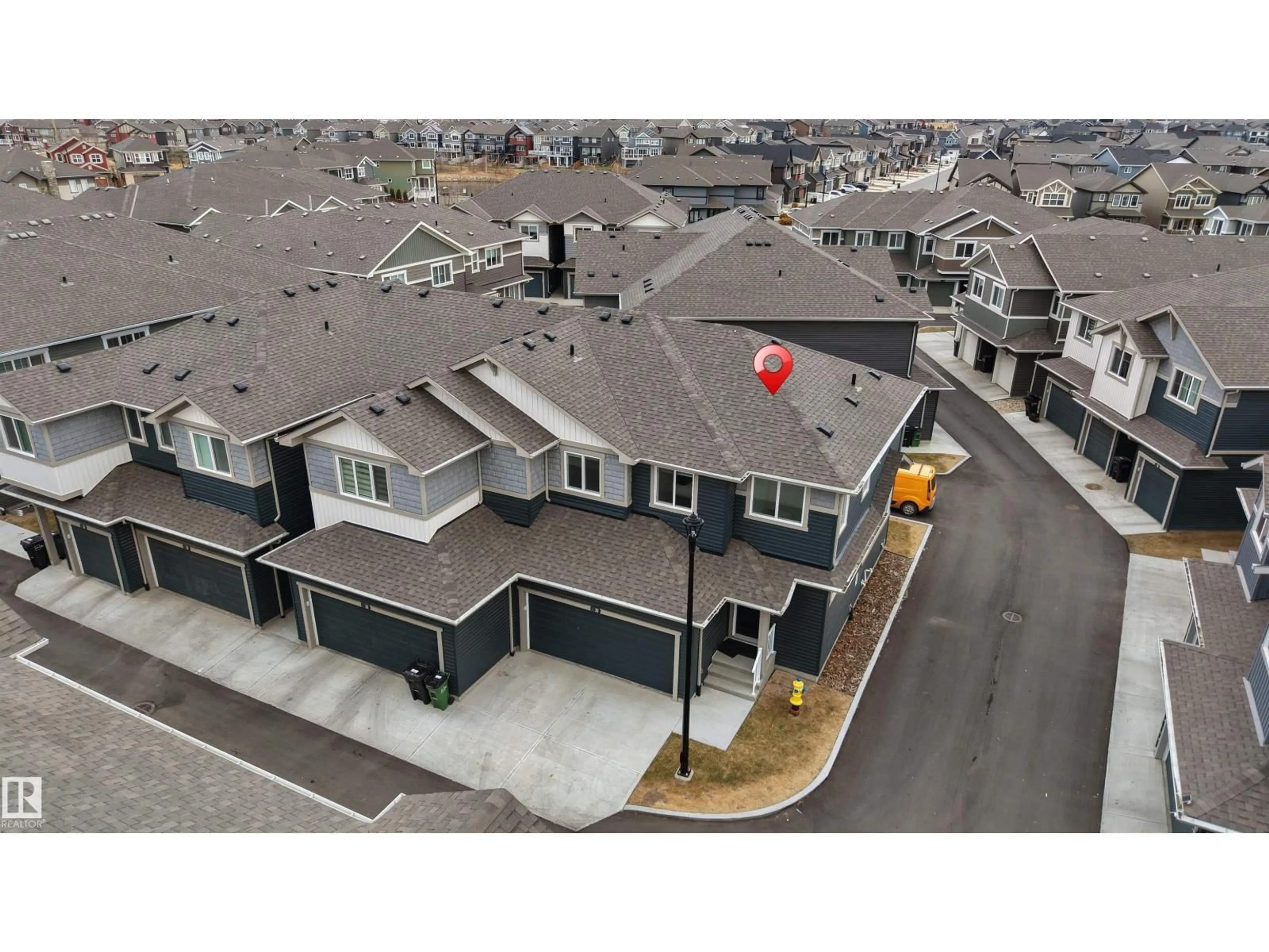 A pic from outside/outdoor area/front of a property/back of a property/a pic from drone, unknown for 39 603 ORCHARDS BV SW, Edmonton Alberta T6X2W8
