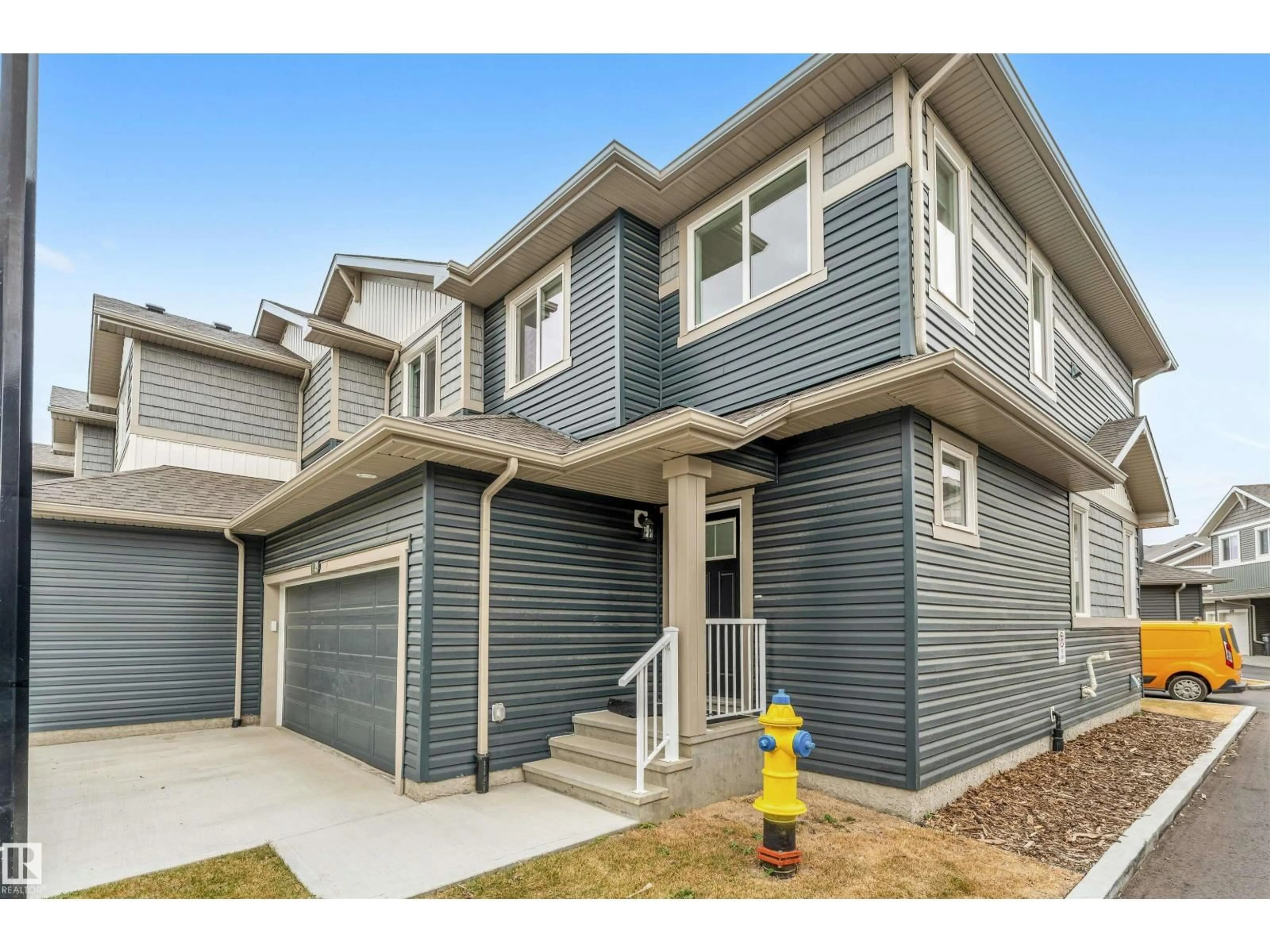 Home with vinyl exterior material, street for 39 603 ORCHARDS BV SW, Edmonton Alberta T6X2W8