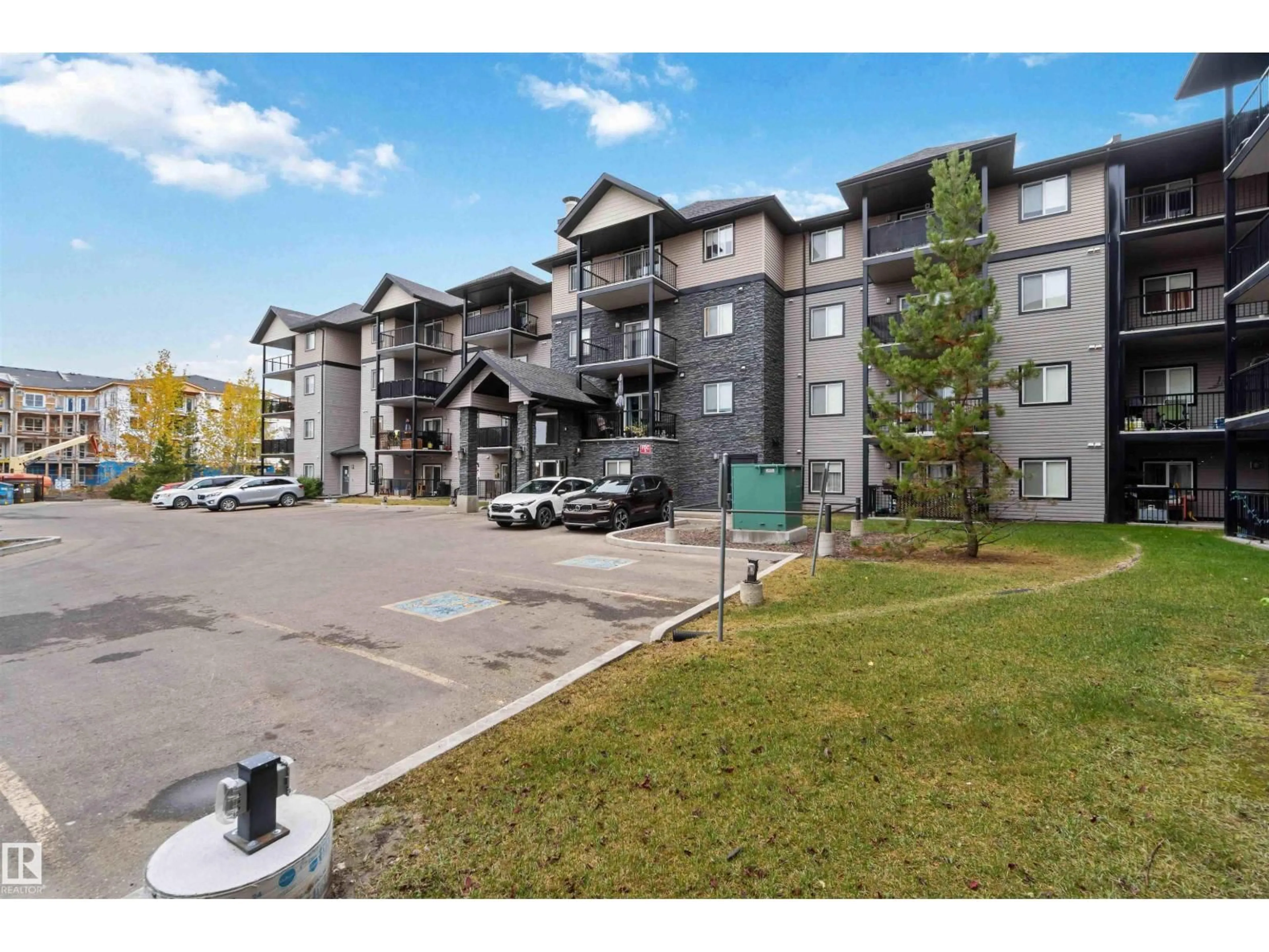 A pic from outside/outdoor area/front of a property/back of a property/a pic from drone, unknown for #204 - 14808 125 ST, Edmonton Alberta T5X0G1