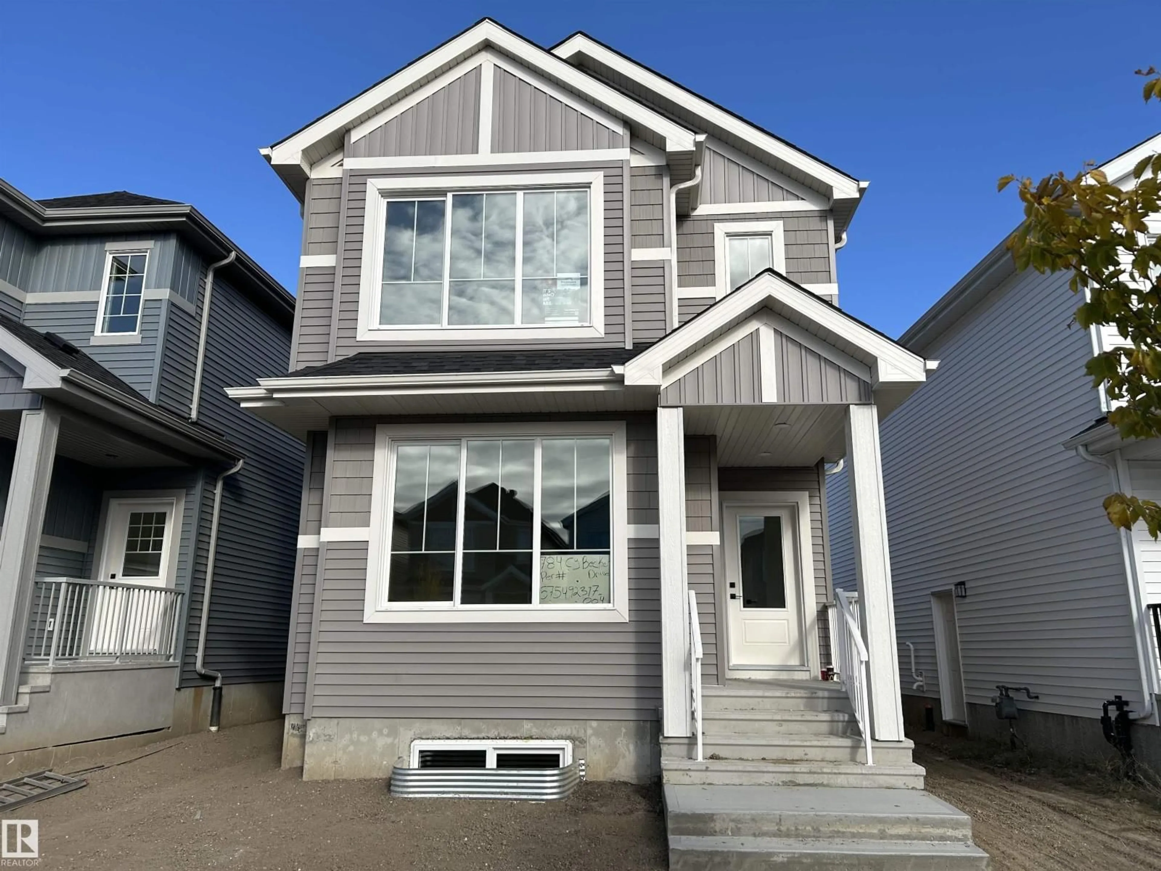 Home with vinyl exterior material, street for 784 CY BECKER DR, Edmonton Alberta T5Y2W4