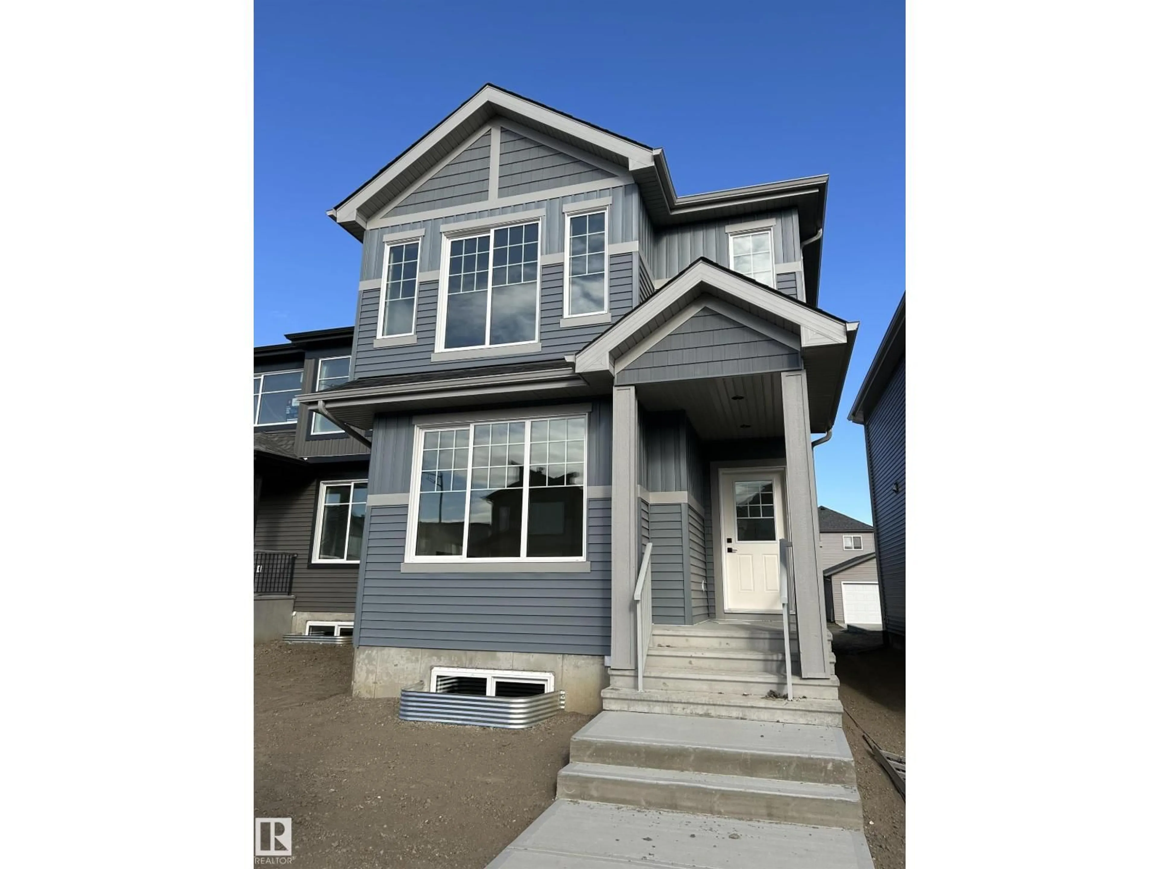 Home with vinyl exterior material, street for 786 CY BECKER DR, Edmonton Alberta T5Y2W4