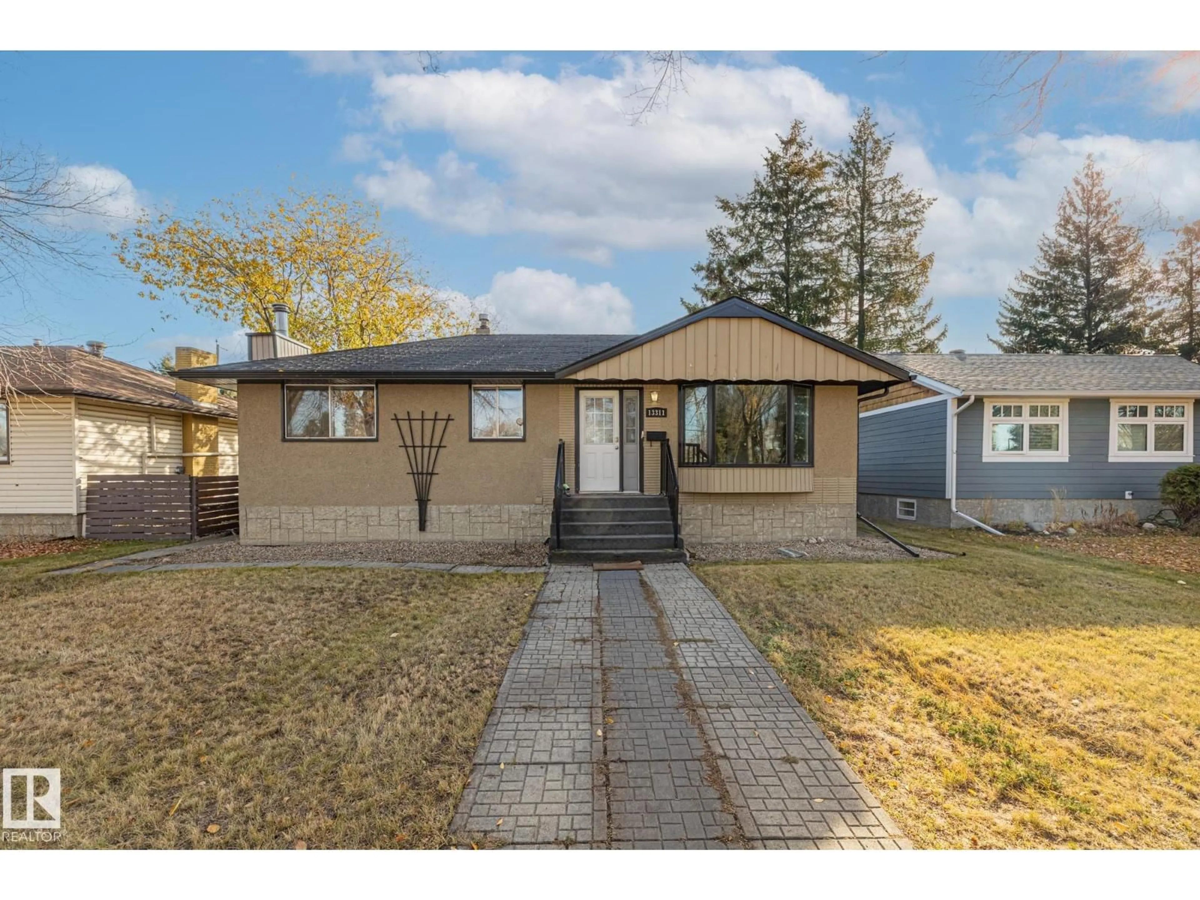 Home with vinyl exterior material, street for 13311 DOVERCOURT AV, Edmonton Alberta T5L4E3