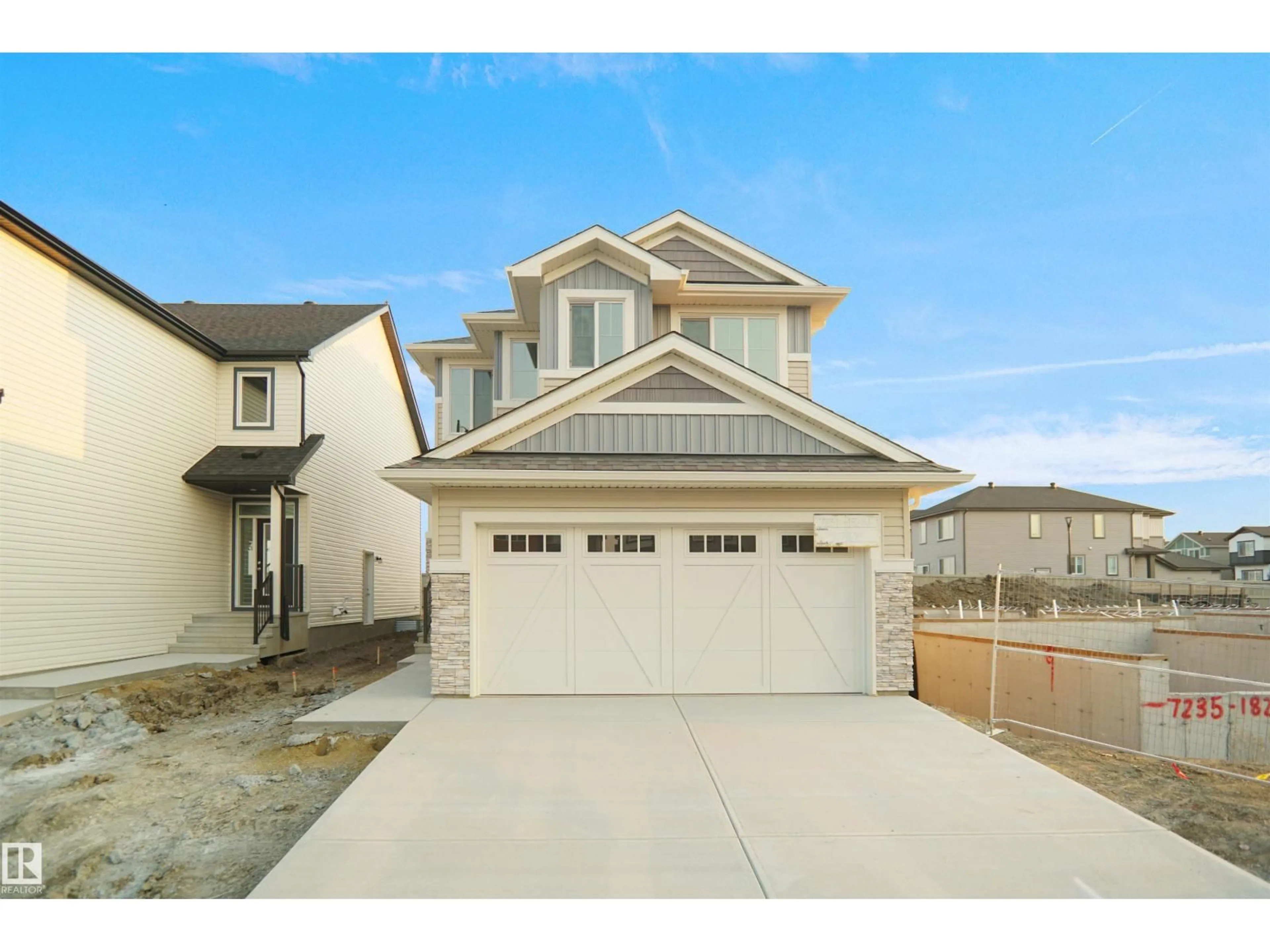 Home with vinyl exterior material, street for 7235 182 AV, Edmonton Alberta T5Z0L5
