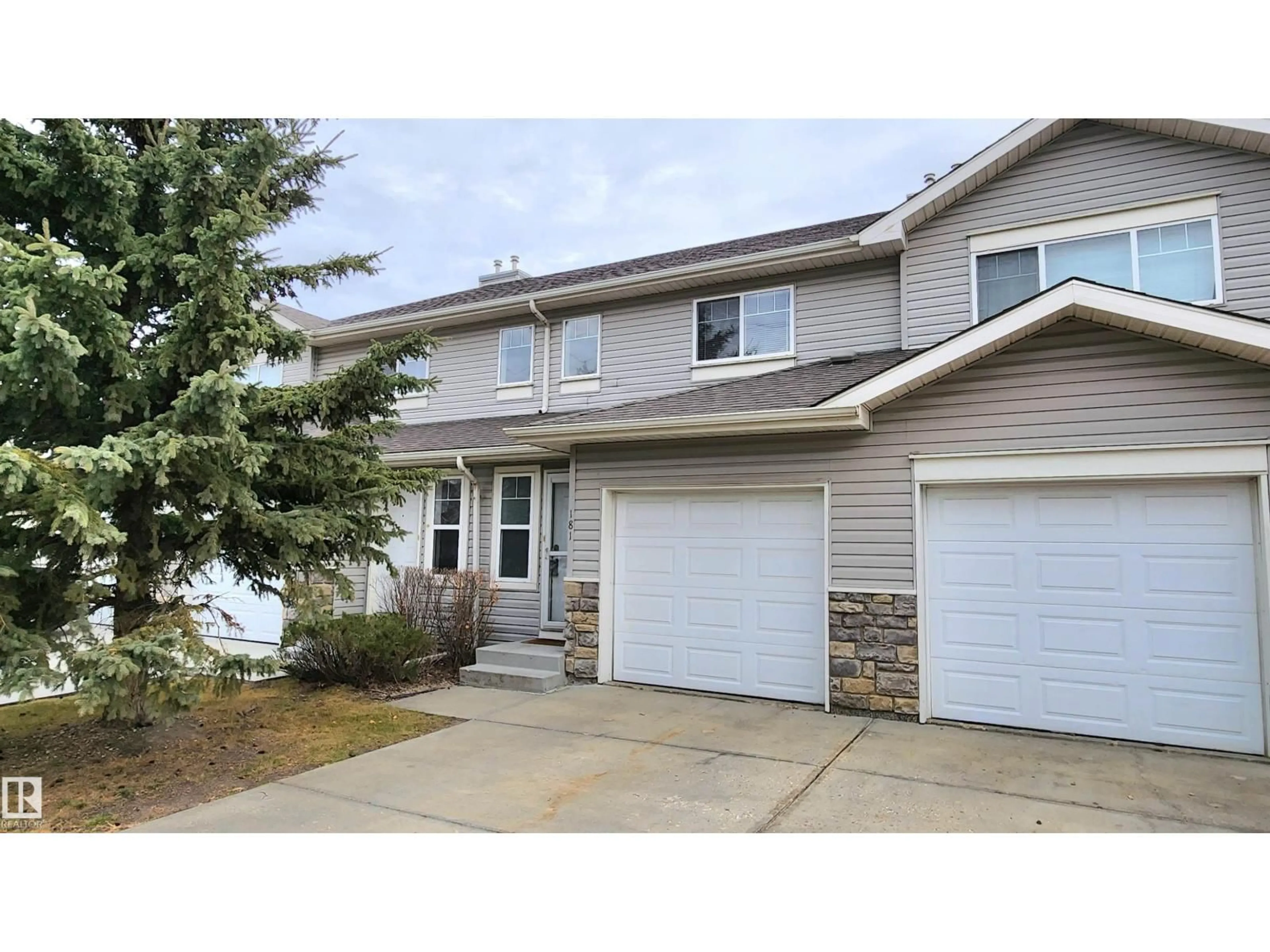 Home with vinyl exterior material, street for SW - 181 230 EDWARDS DR, Edmonton Alberta T6X1G7