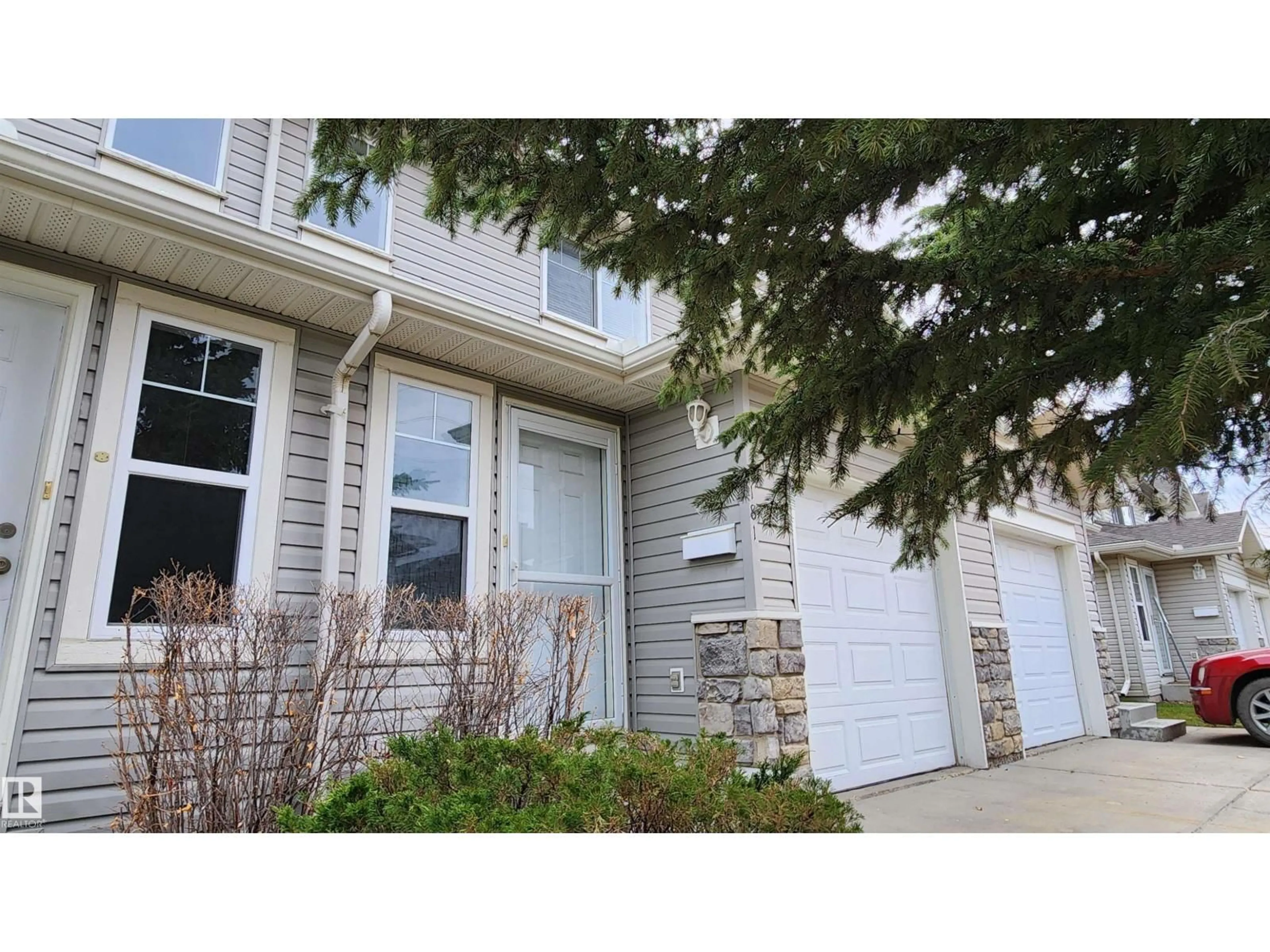 Home with vinyl exterior material, street for SW - 181 230 EDWARDS DR, Edmonton Alberta T6X1G7