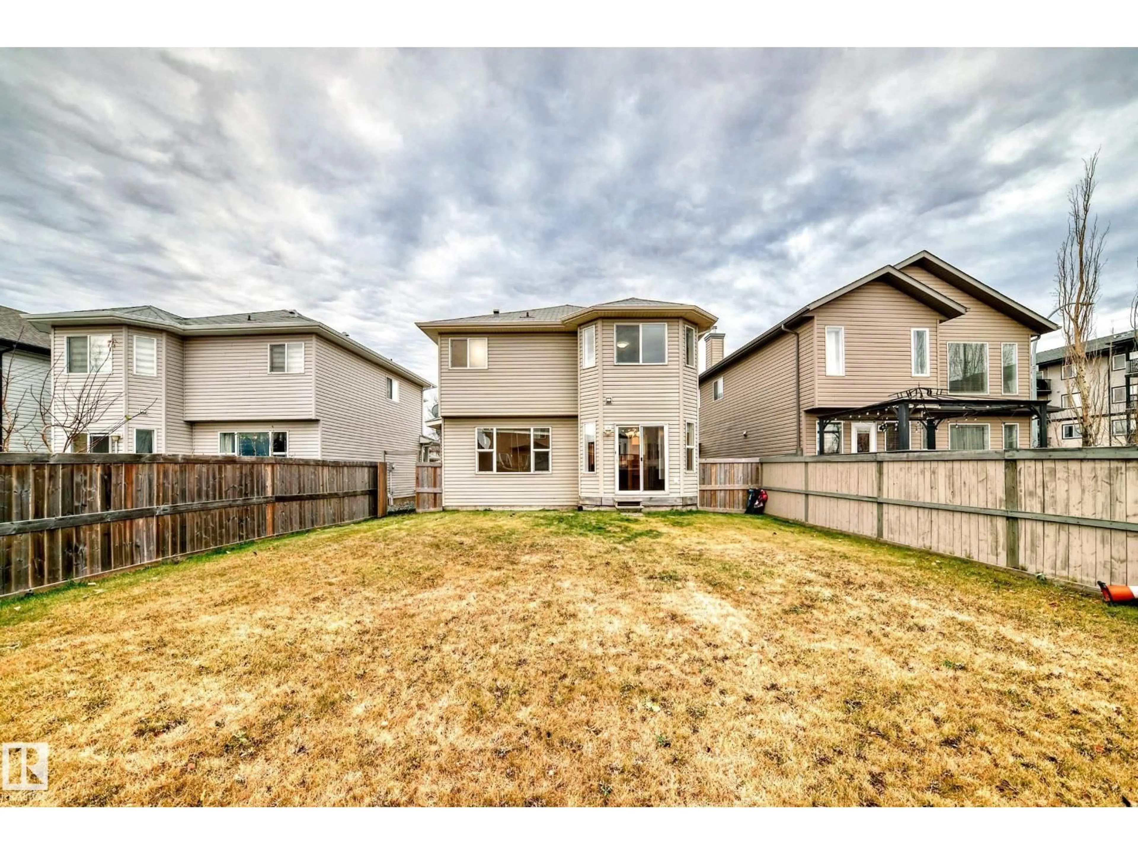 A pic from outside/outdoor area/front of a property/back of a property/a pic from drone, street for 5930 165 AV, Edmonton Alberta T5Y0J1