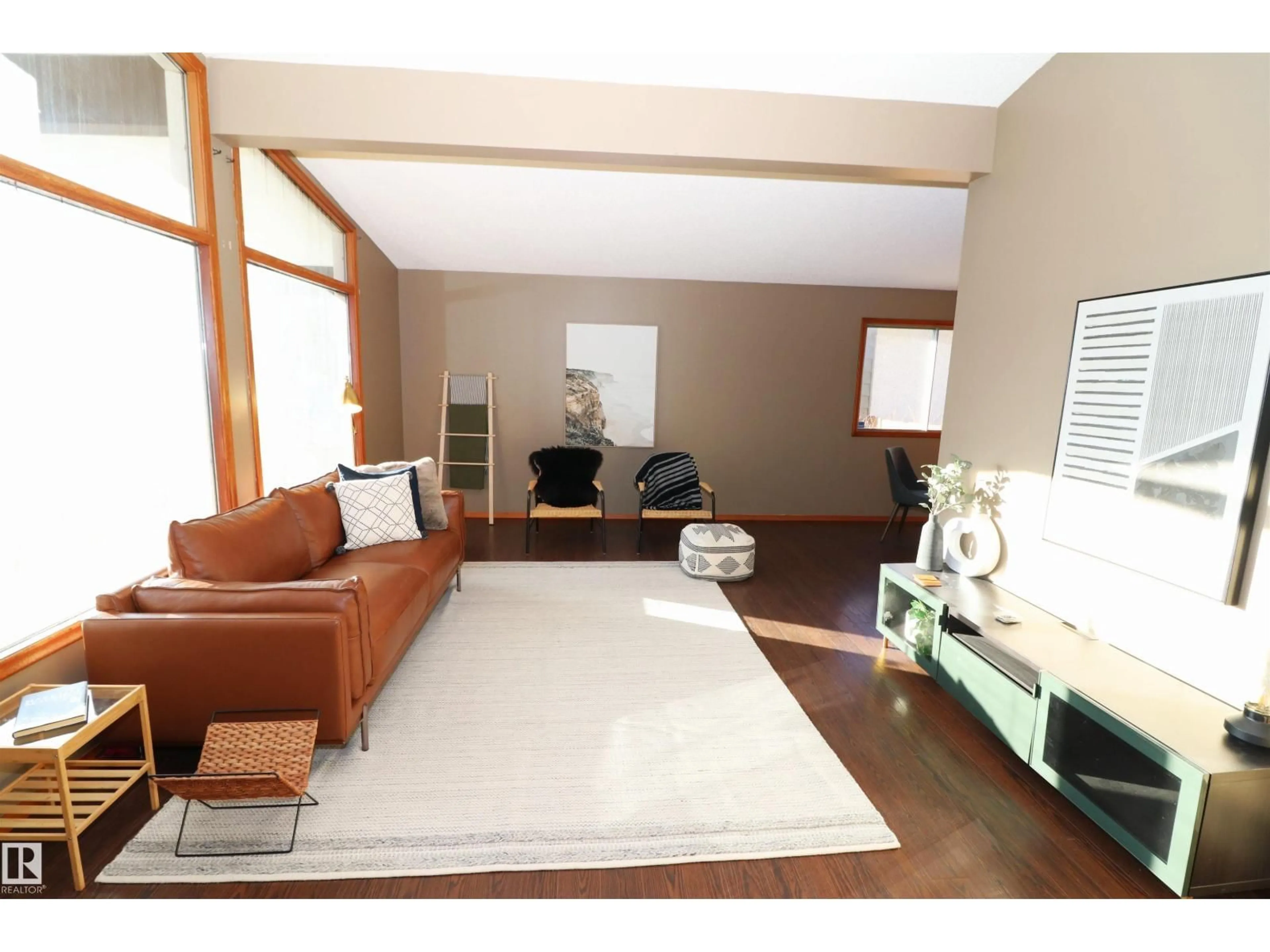 Living room with furniture, wood/laminate floor for 11716 42 AV, Edmonton Alberta T6M1A7