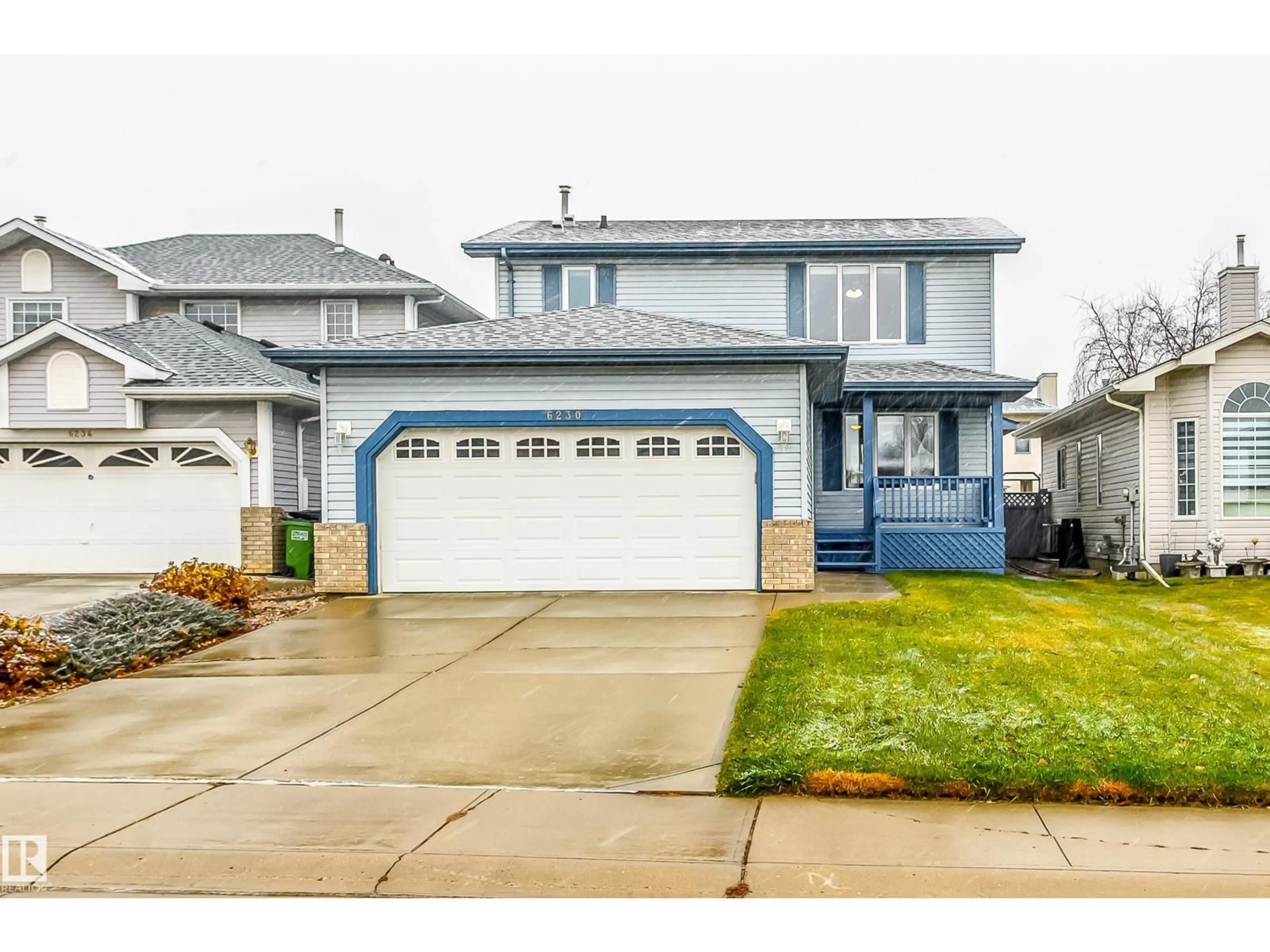 Home with vinyl exterior material, street for 6230 159A AV, Edmonton Alberta T5Y2R9