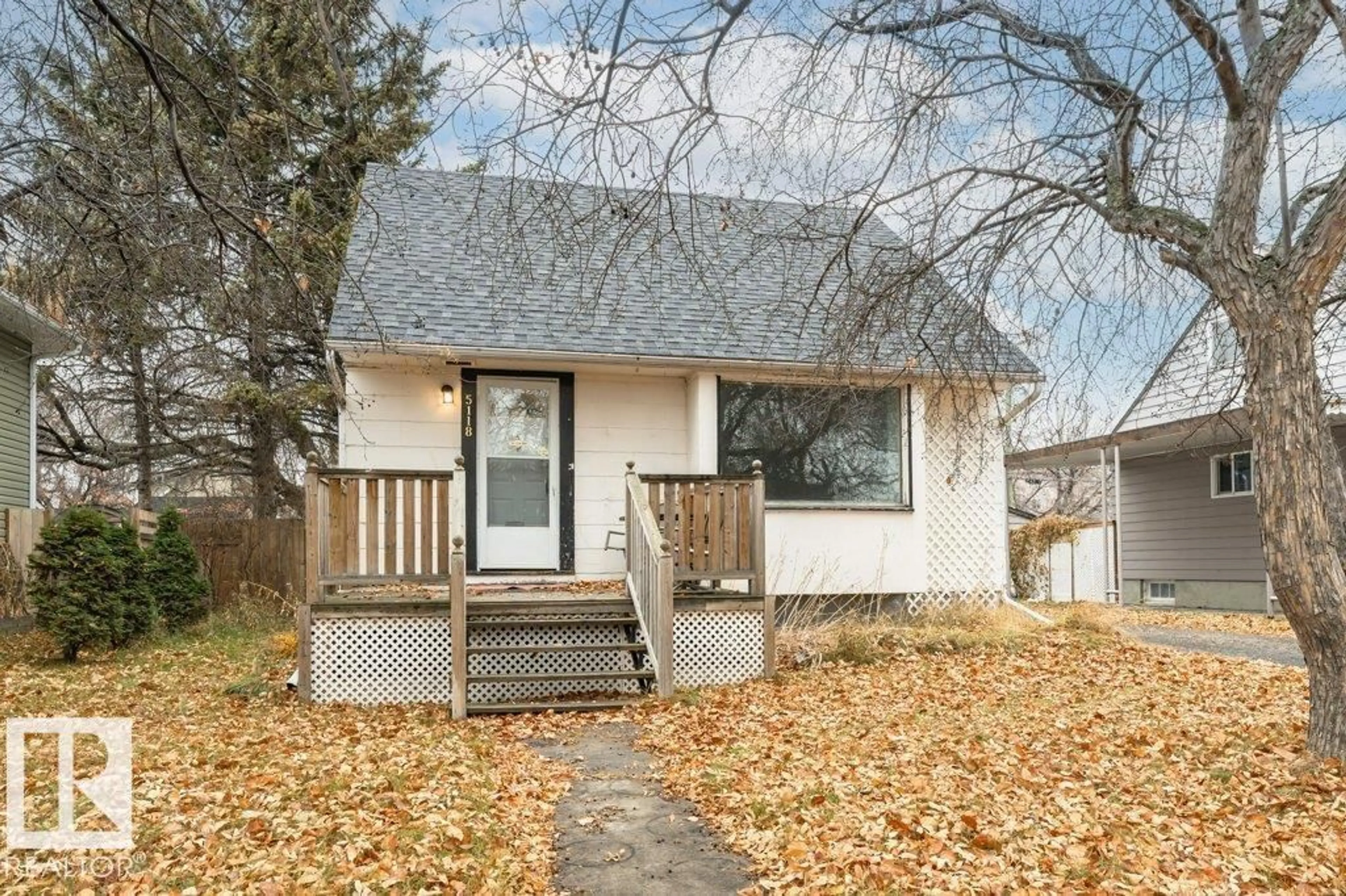 Home with vinyl exterior material, street for 5118 48 AV, Leduc Alberta T9E5E5