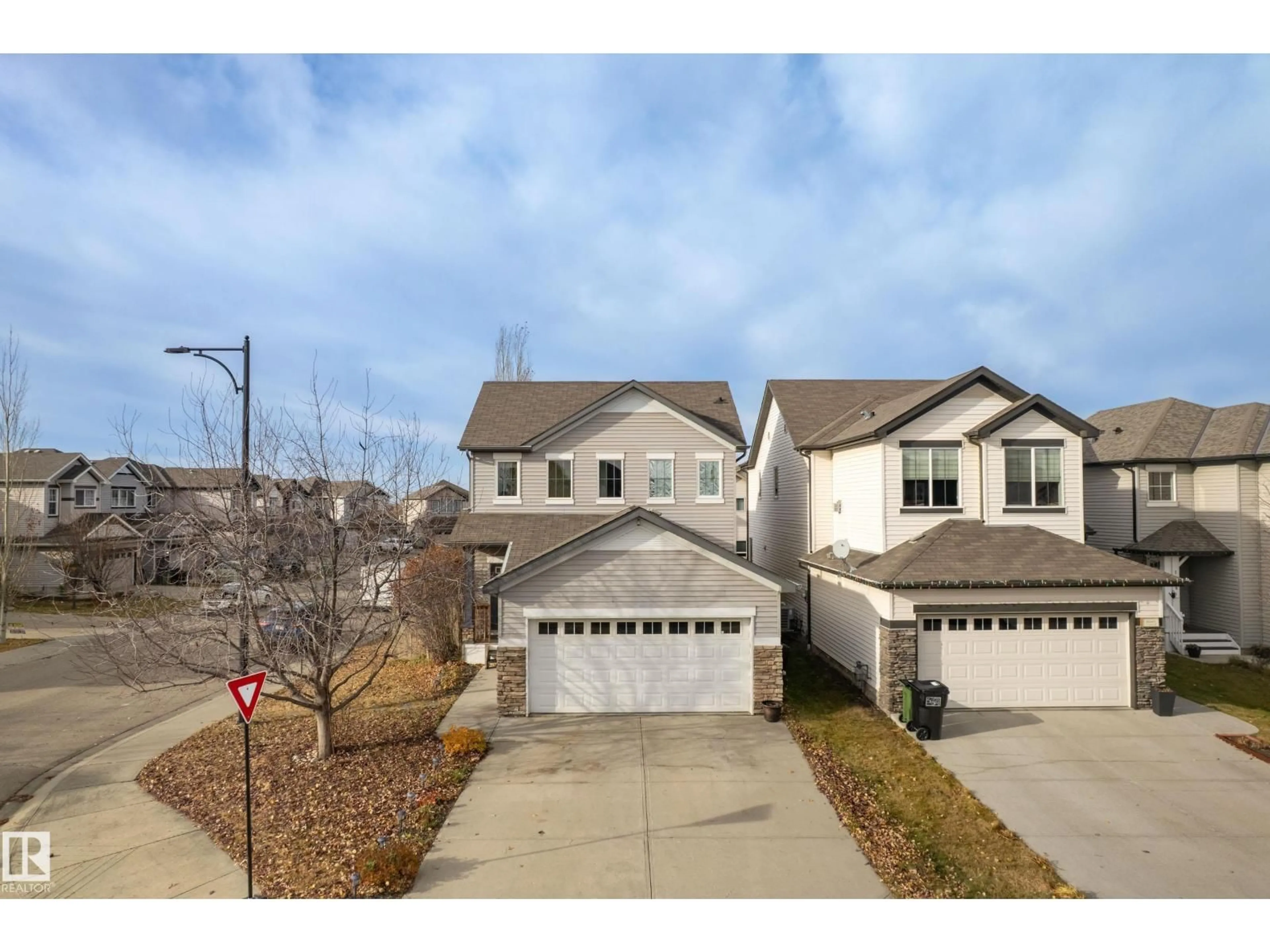 A pic from outside/outdoor area/front of a property/back of a property/a pic from drone, street for 1756 63 ST, Edmonton Alberta T6X0S1