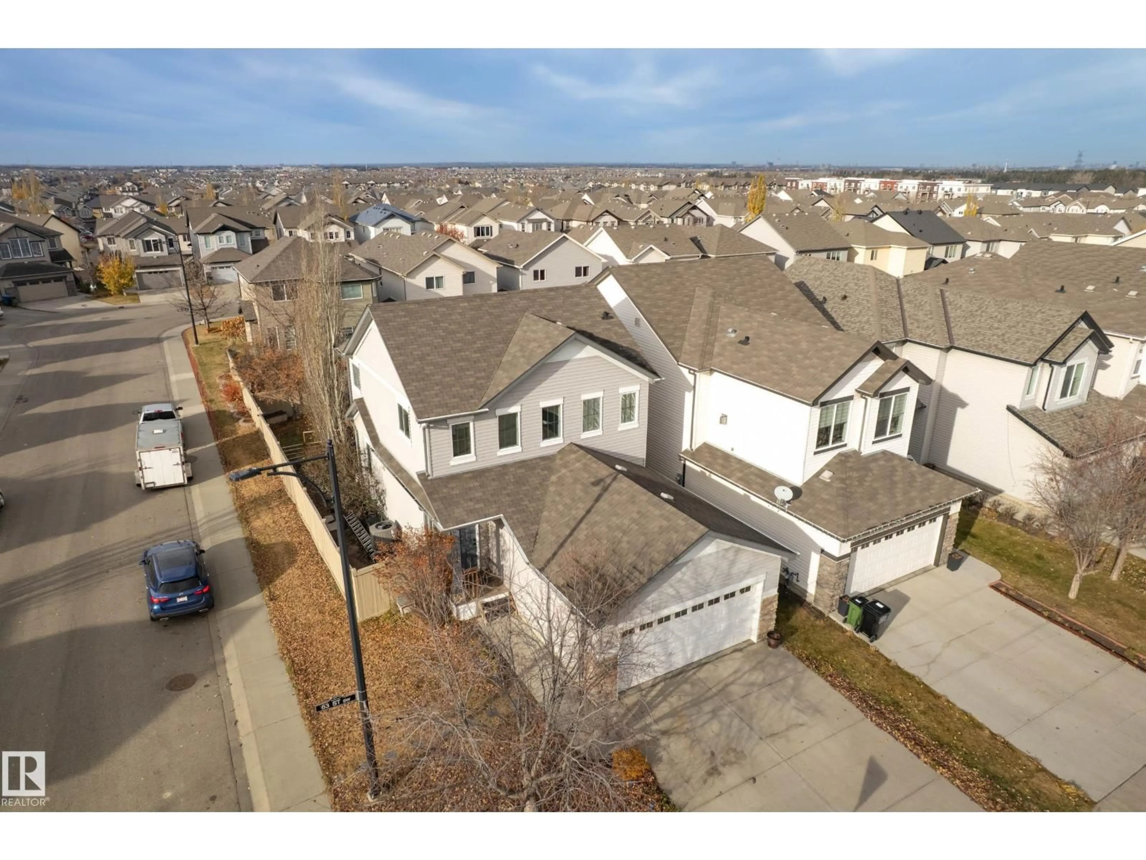 A pic from outside/outdoor area/front of a property/back of a property/a pic from drone, street for 1756 63 ST, Edmonton Alberta T6X0S1